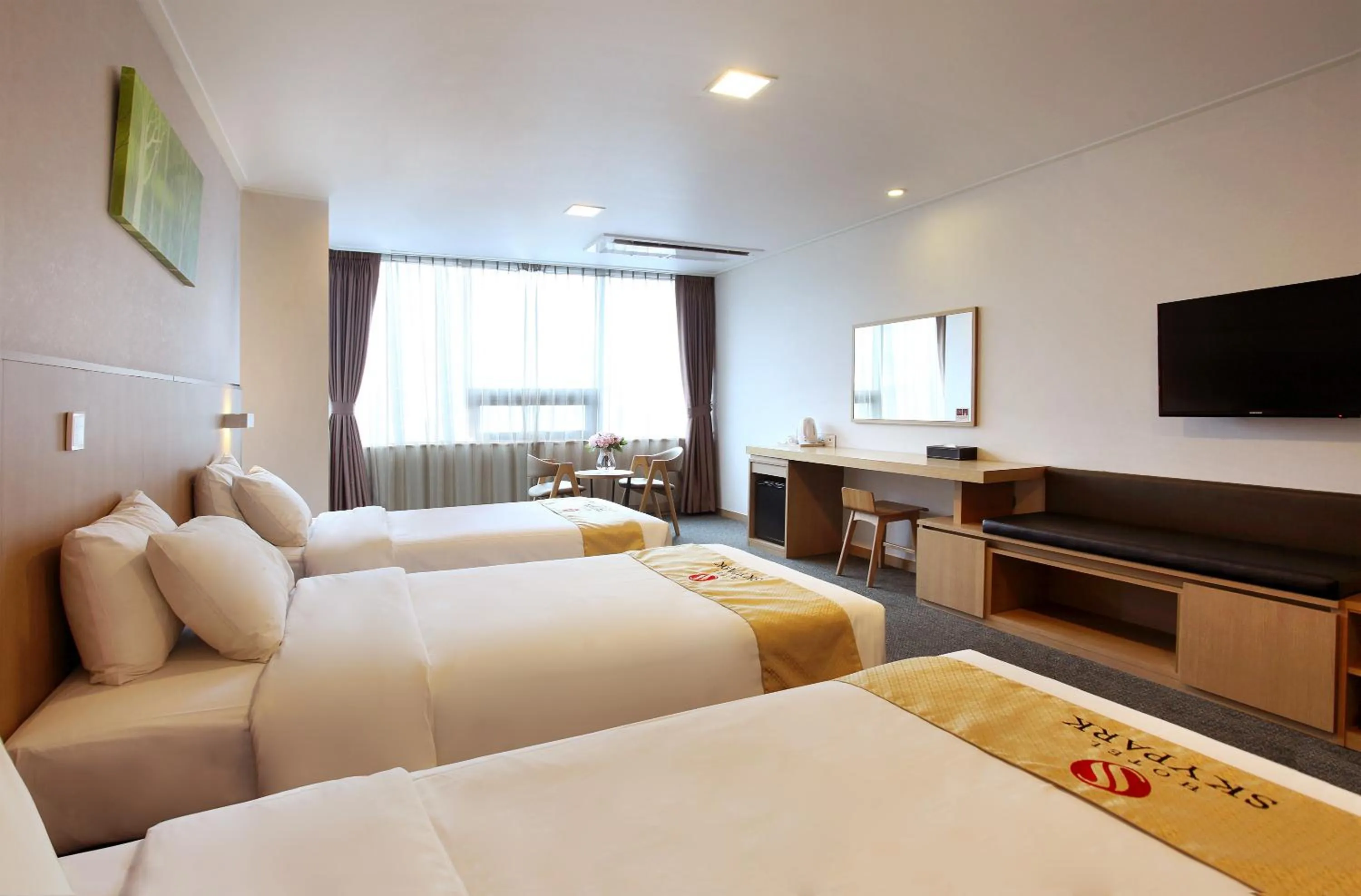 Bedroom, Bed in Hotel Skypark Jeju 1 Newly renovated