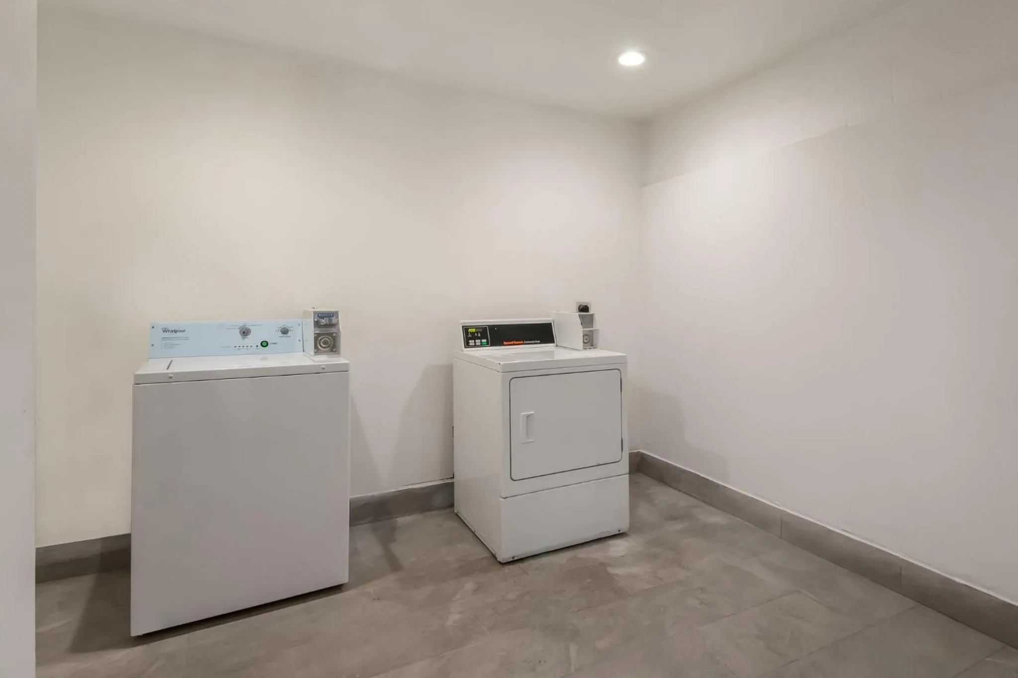laundry in HomeTowne Studios by Red Roof San Antonio - SeaWorld Northwest