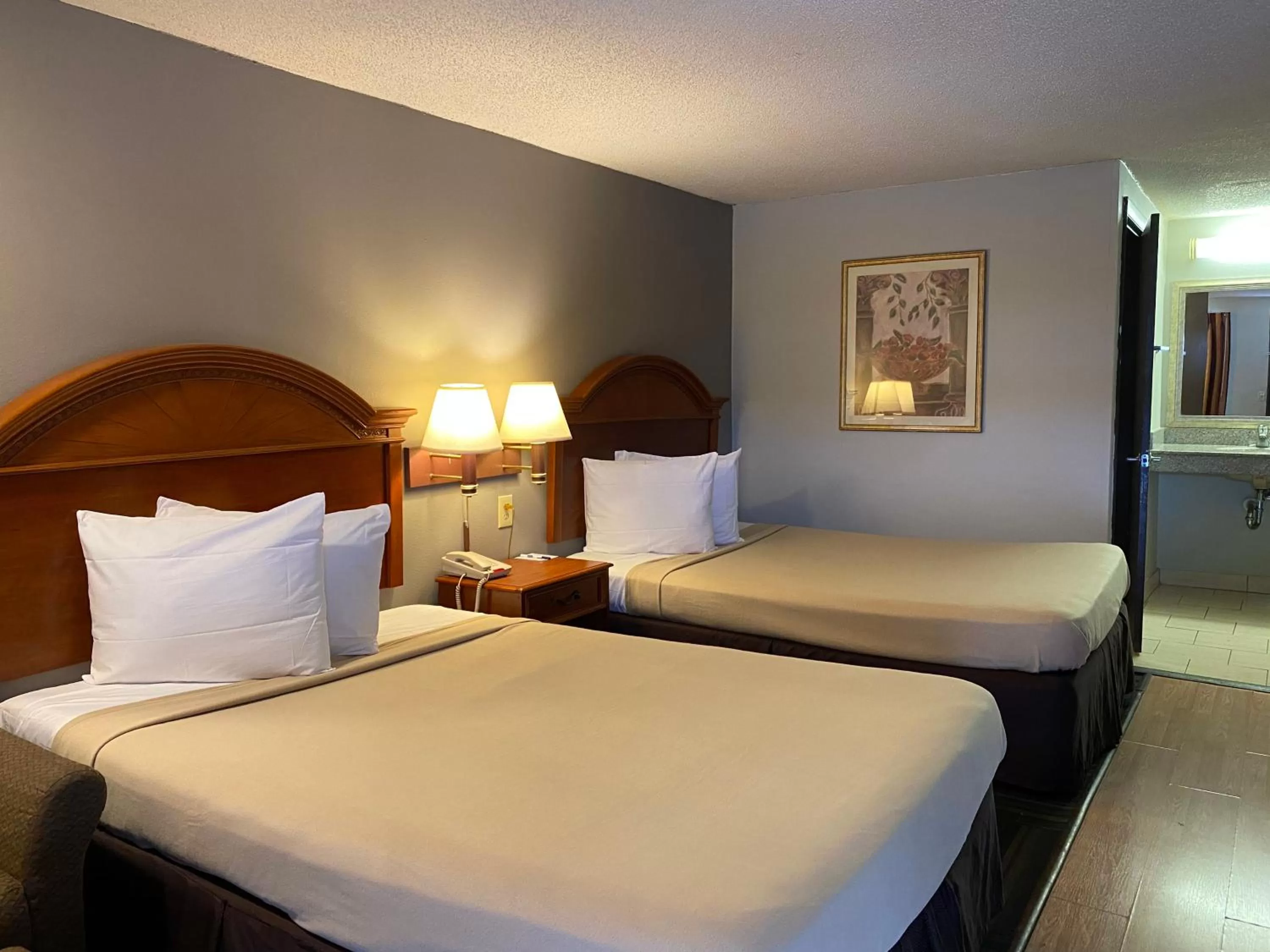 Bedroom, Bed in Travelodge by Wyndham Laurel Ft Meade Near NSA