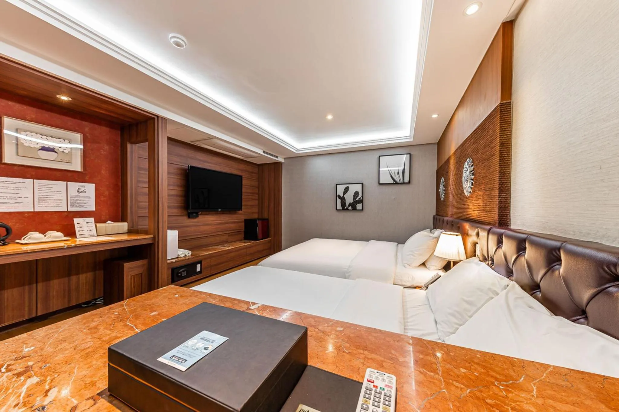 Bed in Friendly DH Naissance Hotel by Mindrum Group