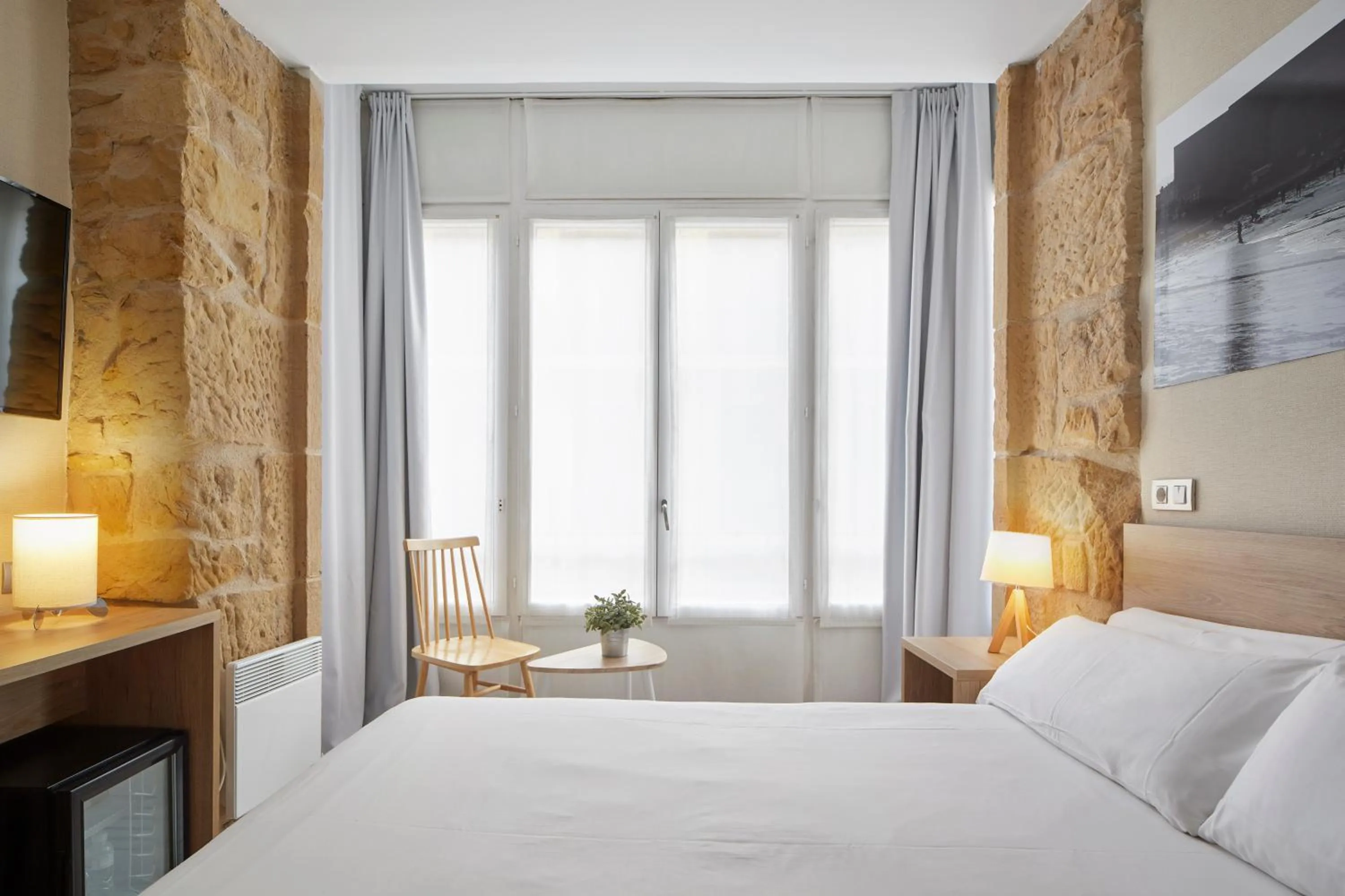 Bed in Welcome Gros Hotel