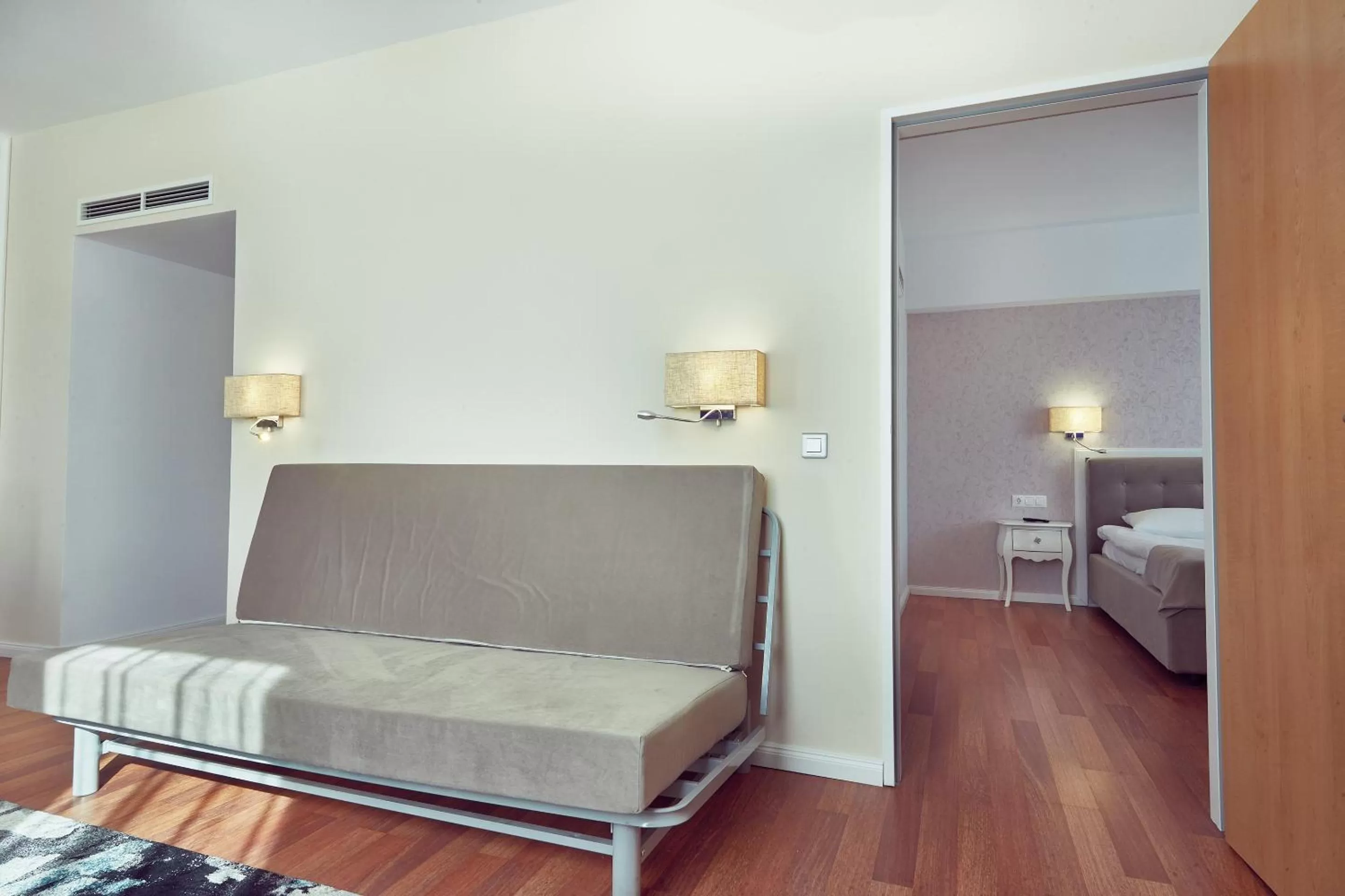 Seating area, Bed in MyContinental Sibiu