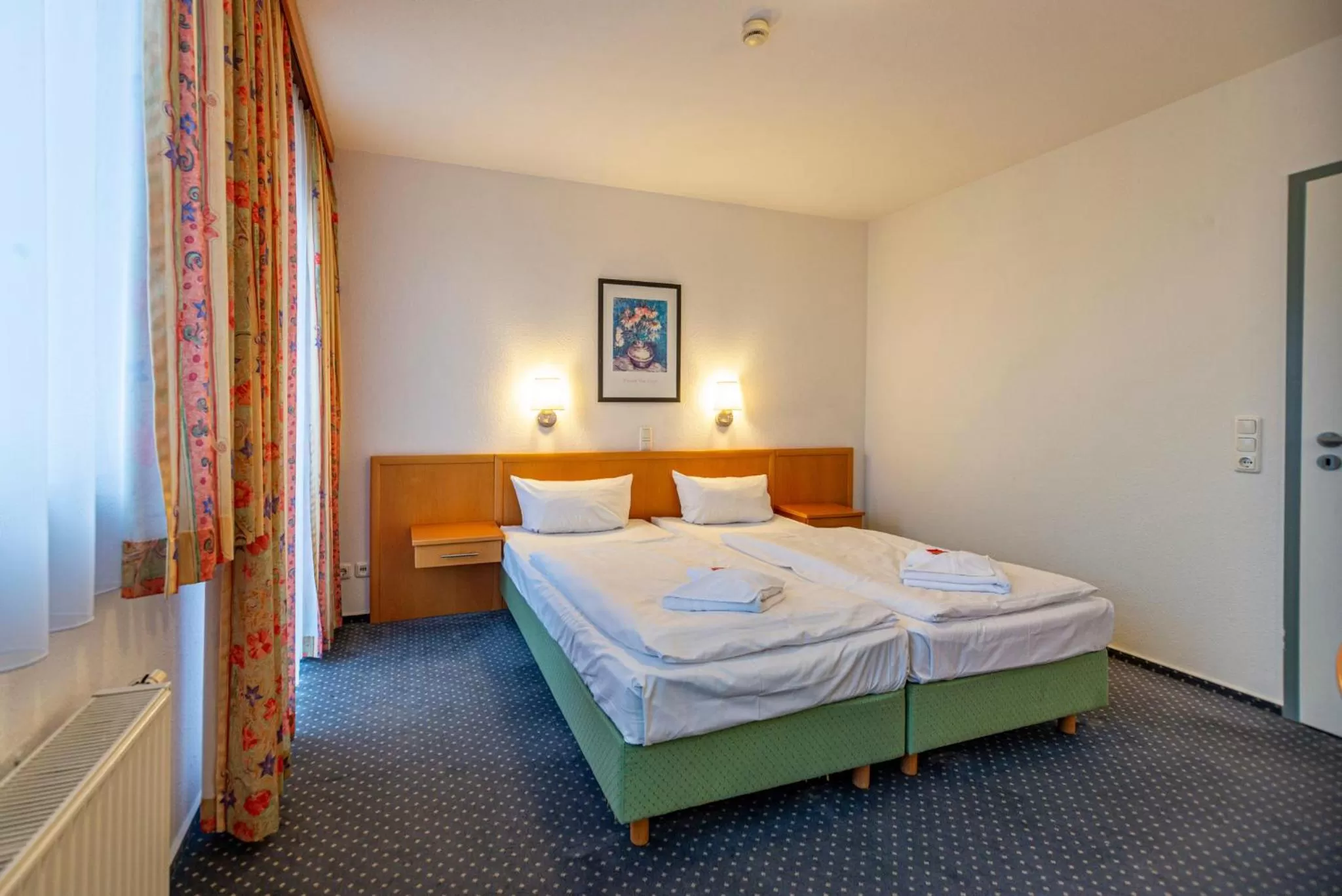 Photo of the whole room, Bed in Hotel Rostock West im "Kritzmow Park"