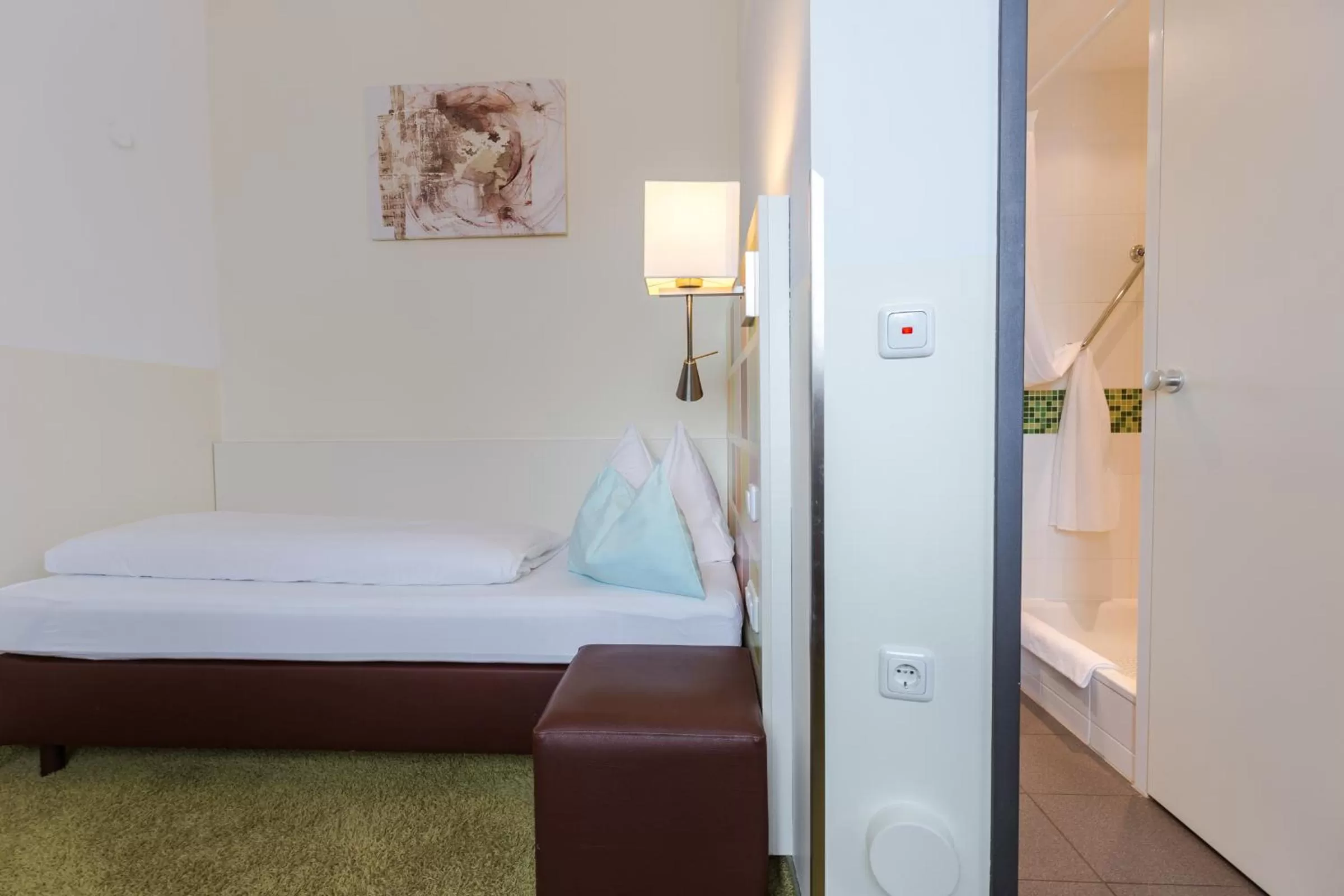 Shower, Bed in Hotel Arooma