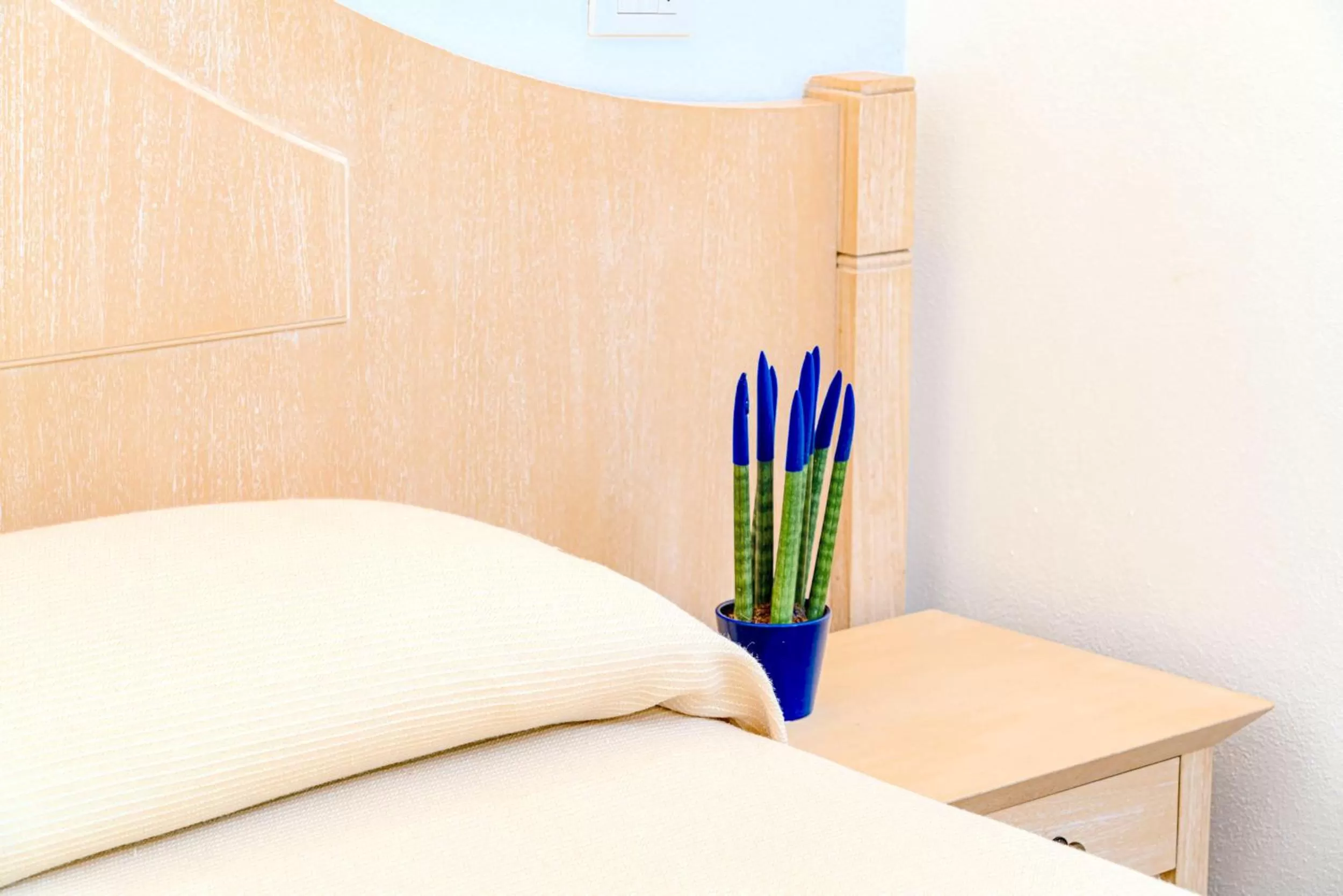 Decorative detail, Bed in Hotel Dei Pini