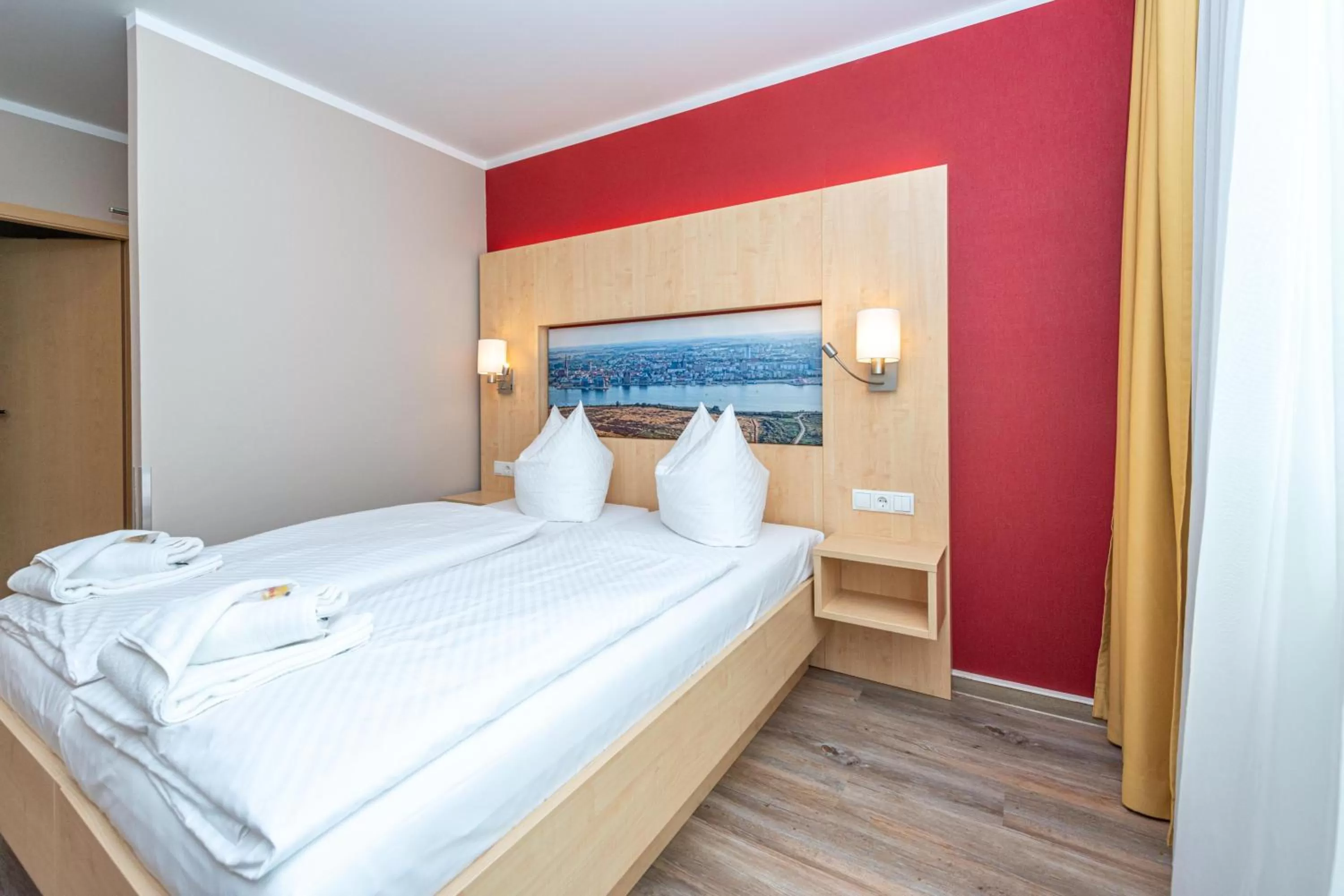 Photo of the whole room, Bed in Hotel an der Stadthalle Rostock