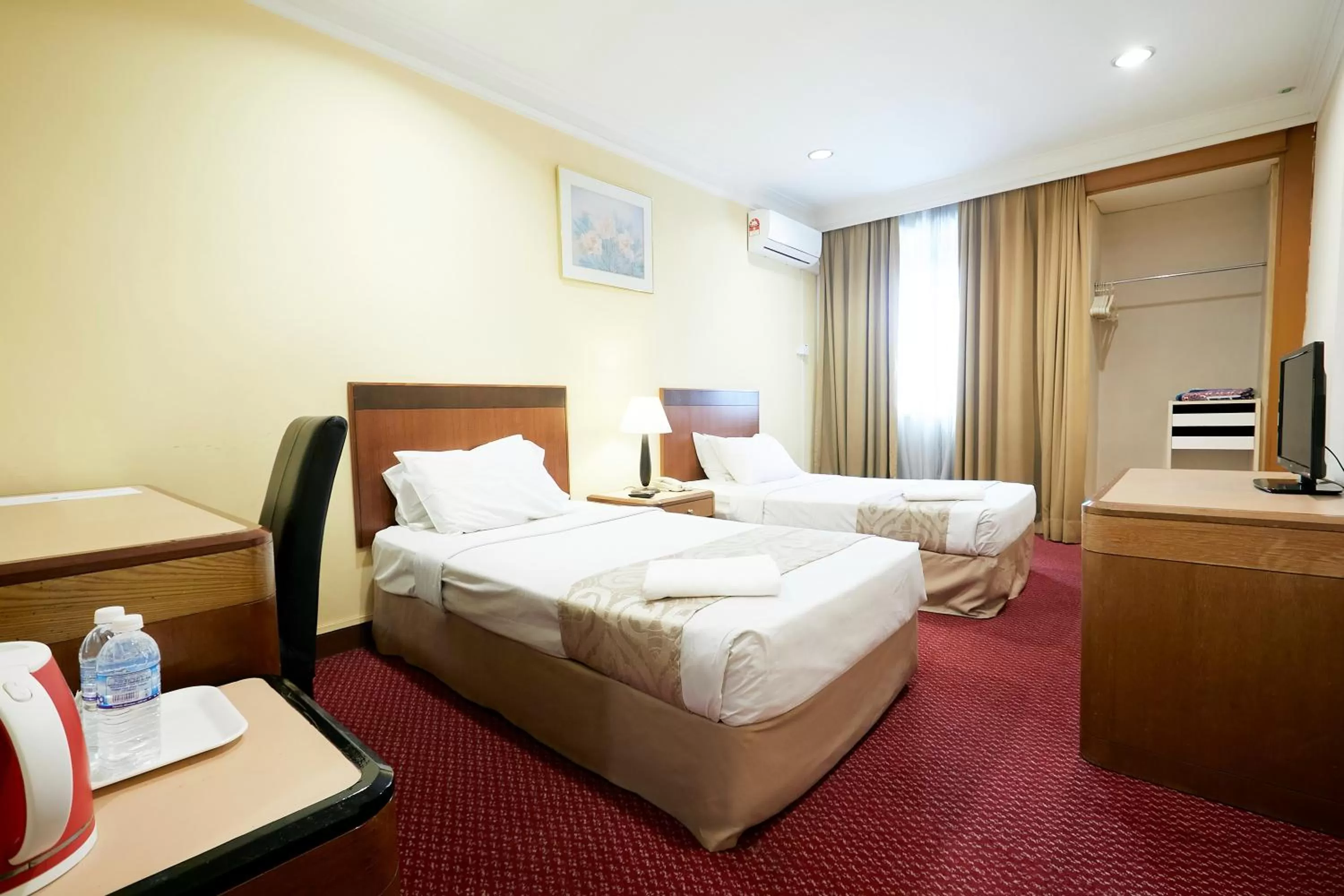 Bed in Grand Pacific Hotel PWTC