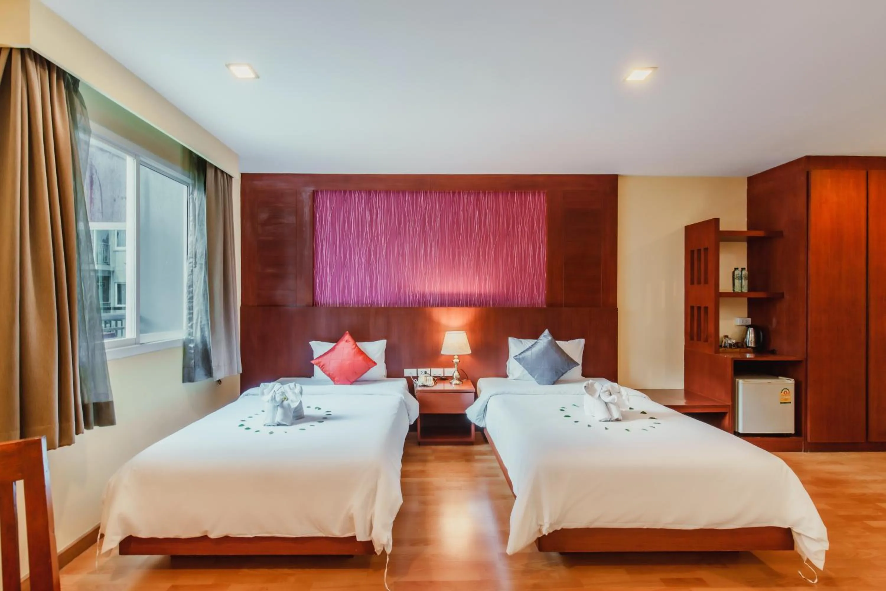 Bed in Elite Suites Patong