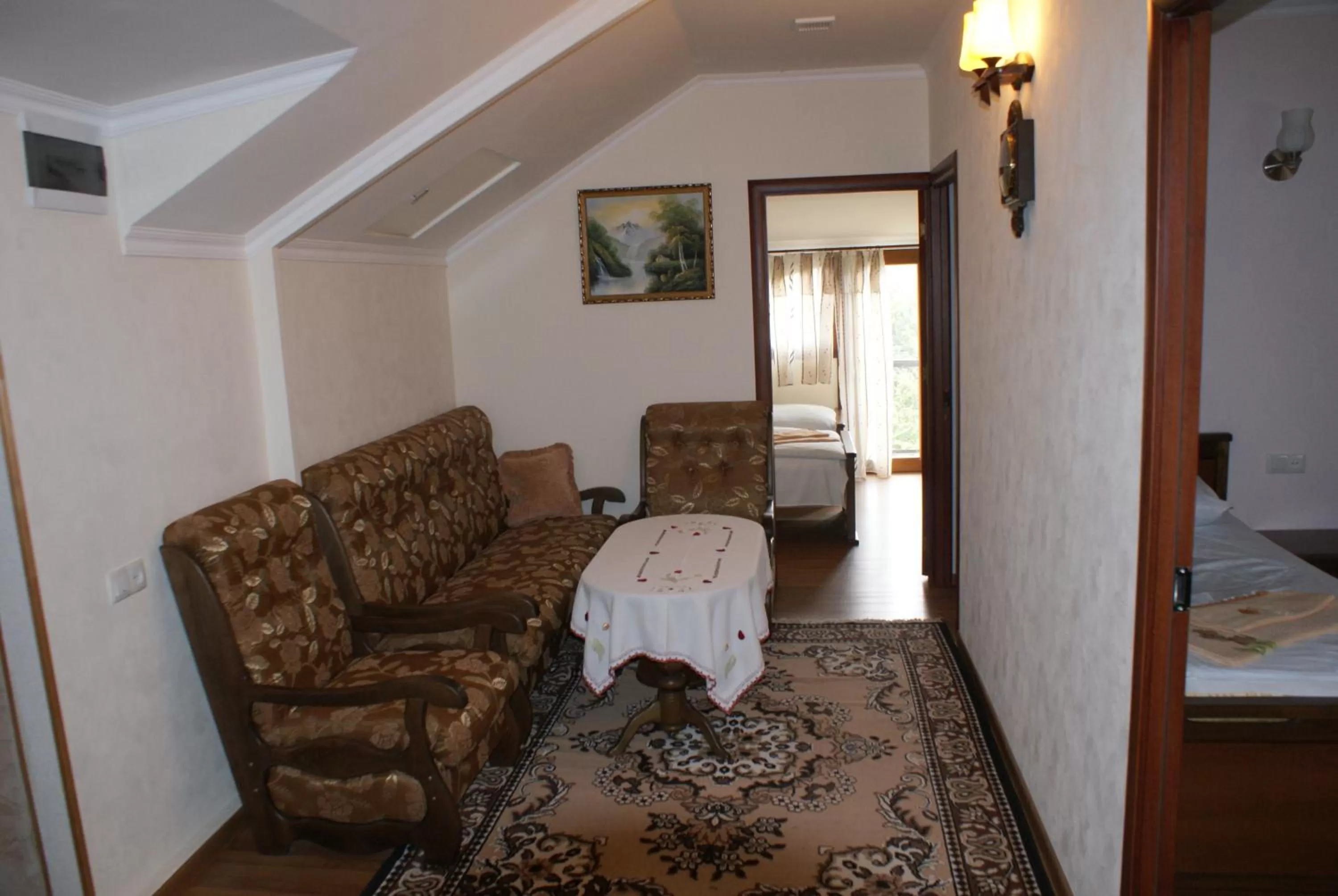 Communal lounge/ TV room in B&B Odzun