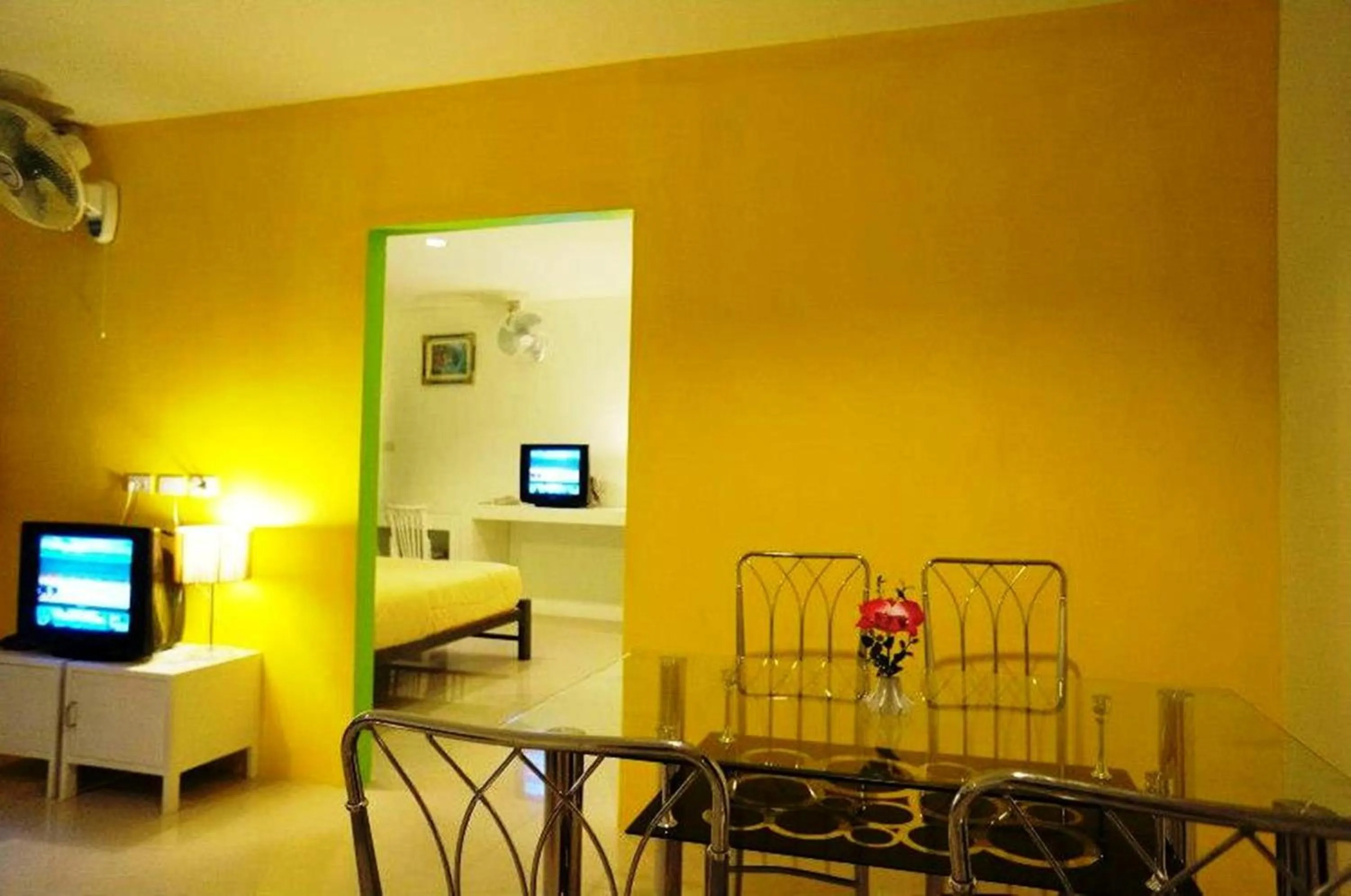 Seating area, Bed in Noble House Chiangmai