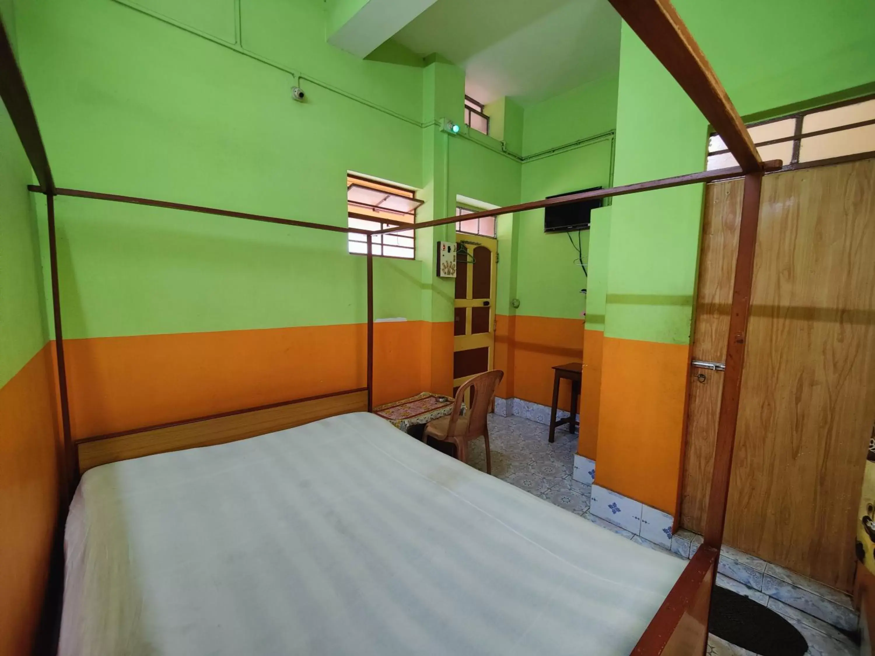 Deluxe Room (2 Adults + 1 Child) - single occupancy in Monalisa Lodge Deluxe Room (2 Adults + 1 Child) - single occupancy in Monalisa Lodge