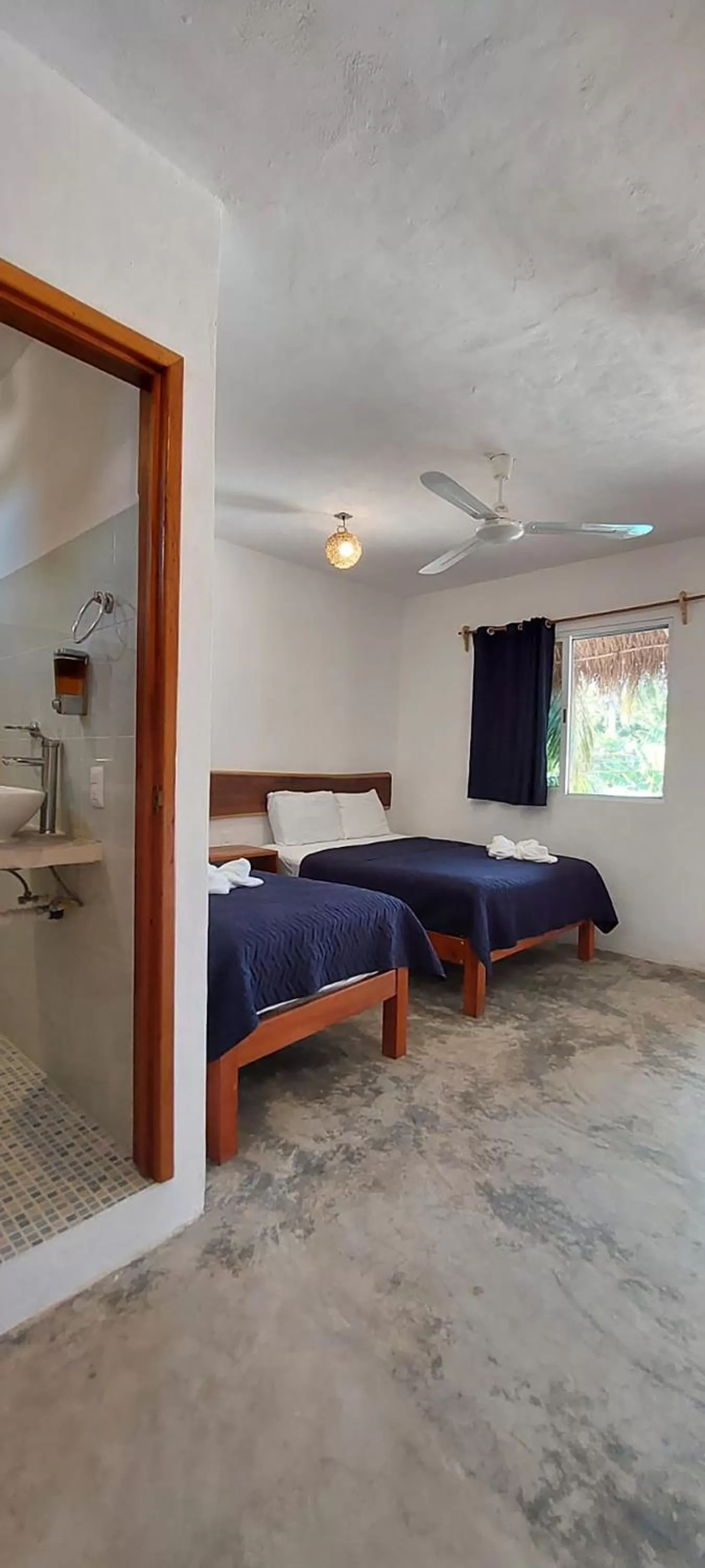 Photo of the whole room, Bed in Hotel Xa´an Bacalar