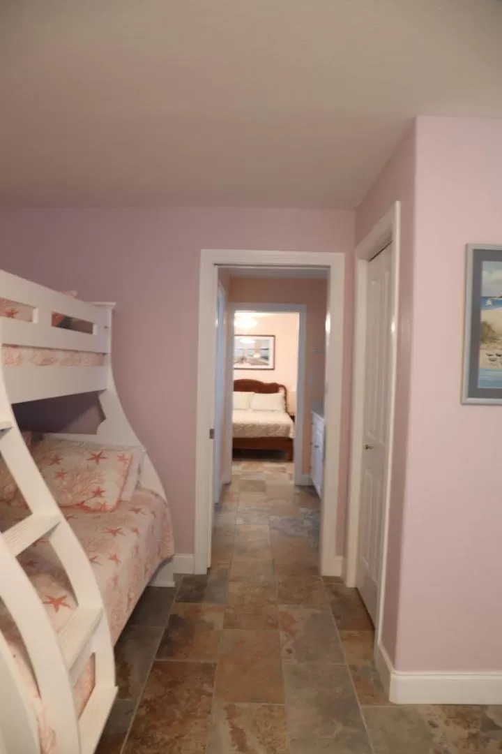 Bed in Executive Keys Condominiums on the Beach