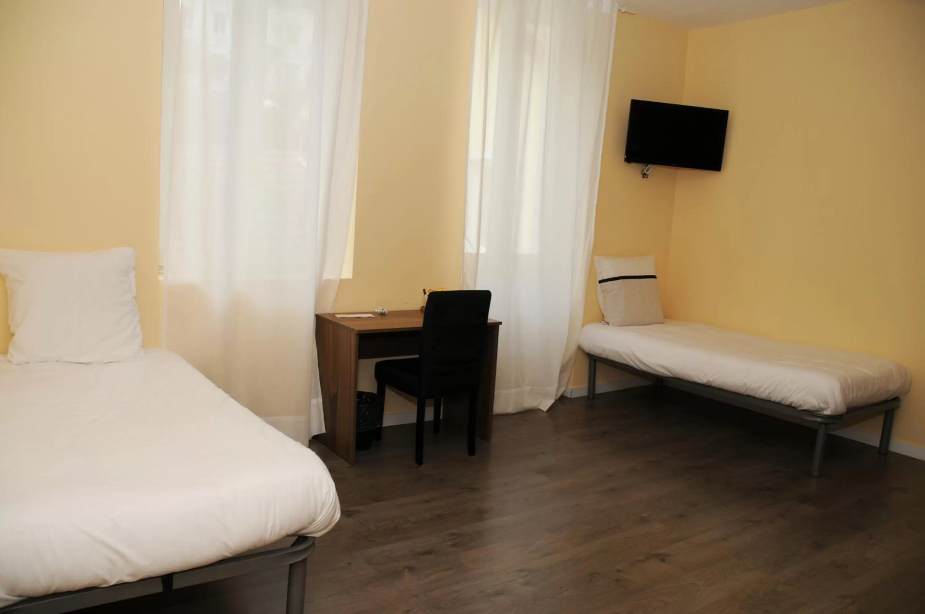 Bed, Room Photo in Kyriad Direct Morez