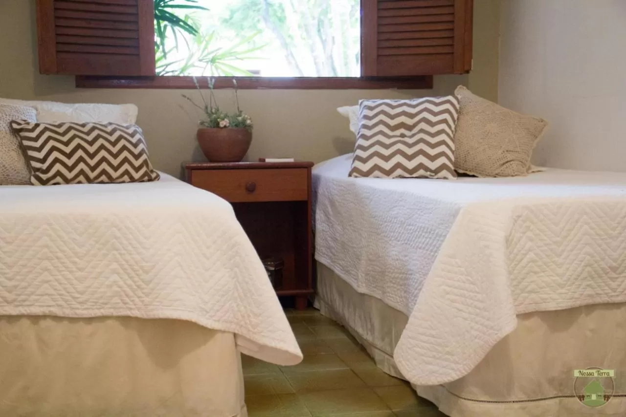 Bed in Pousada Nossa Terra