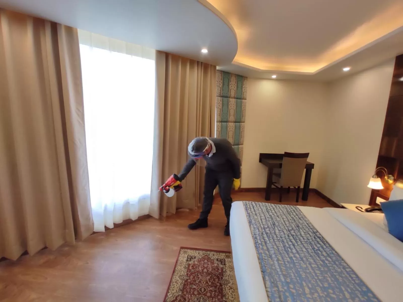 Bedroom in Abhilashi Residency & Spa - Centrally Heated & Air Cooled