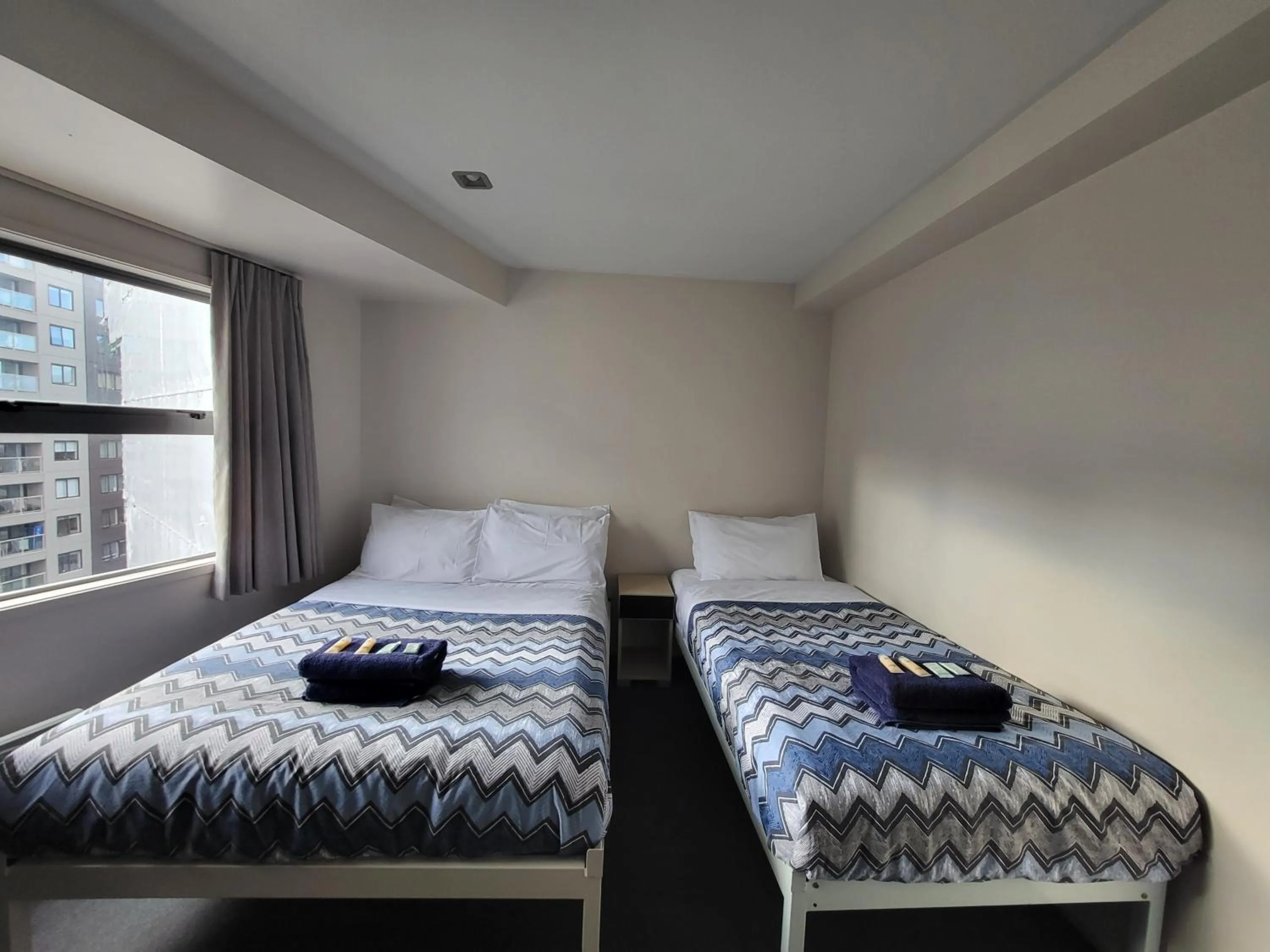 Bed in Empire Apartments