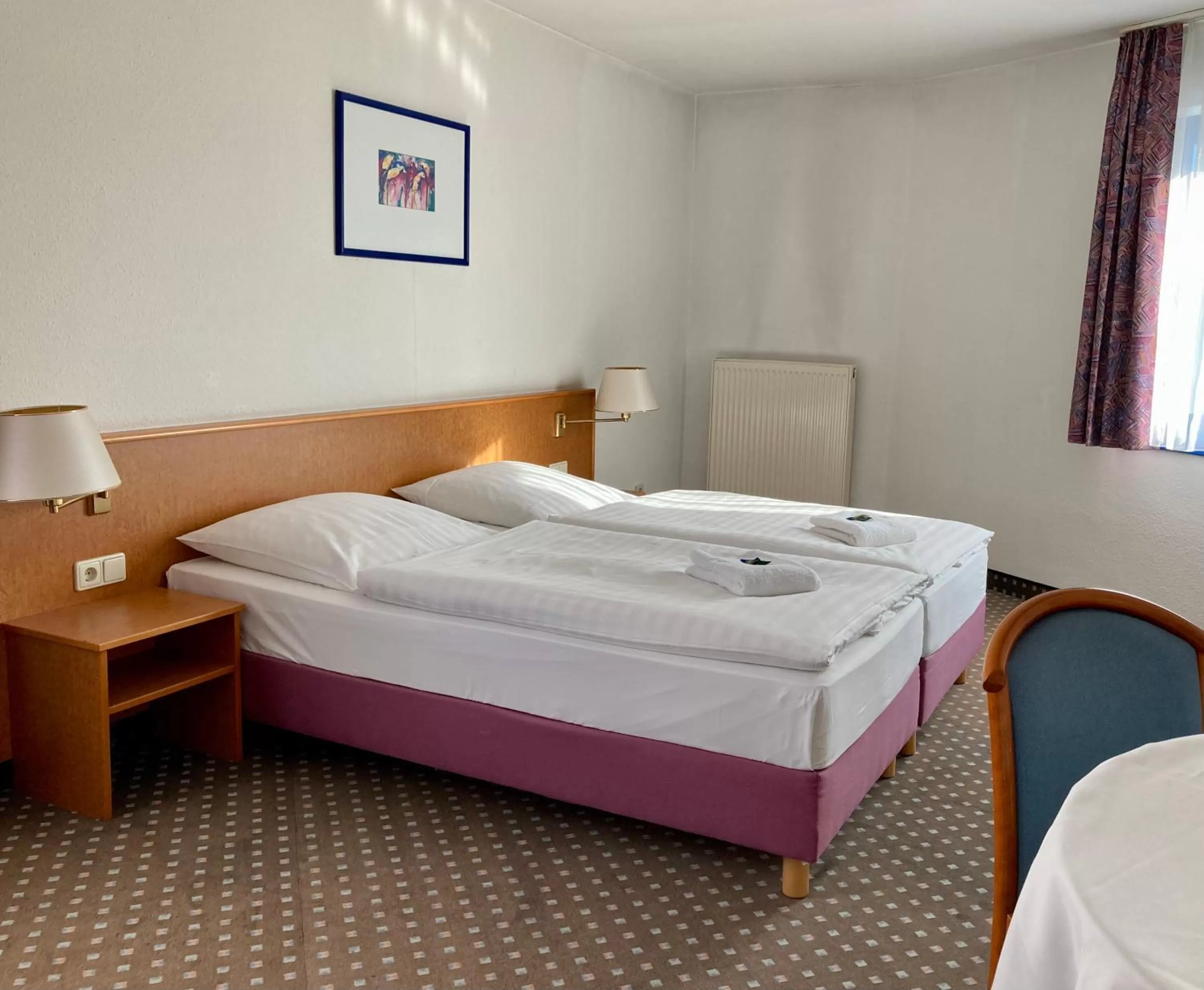 Bed in Akzent Congresshotel Hoyerswerda