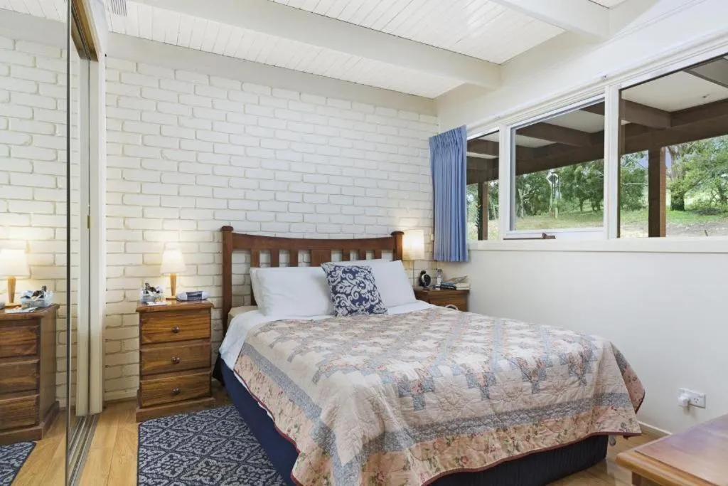 Bed in Gisborne Peak Winery Short Term Stays