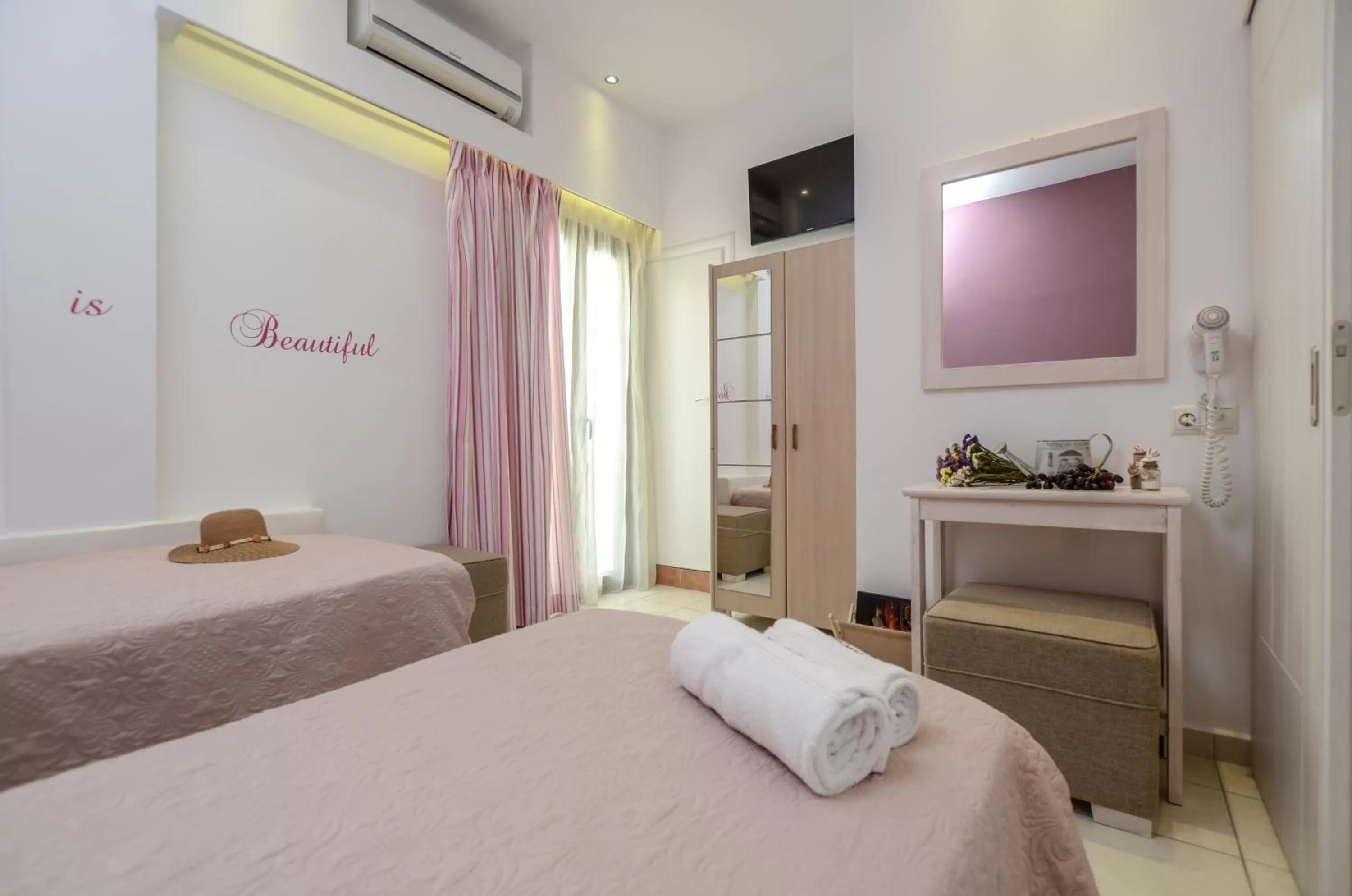 Bed in Panormos Hotel and Studios