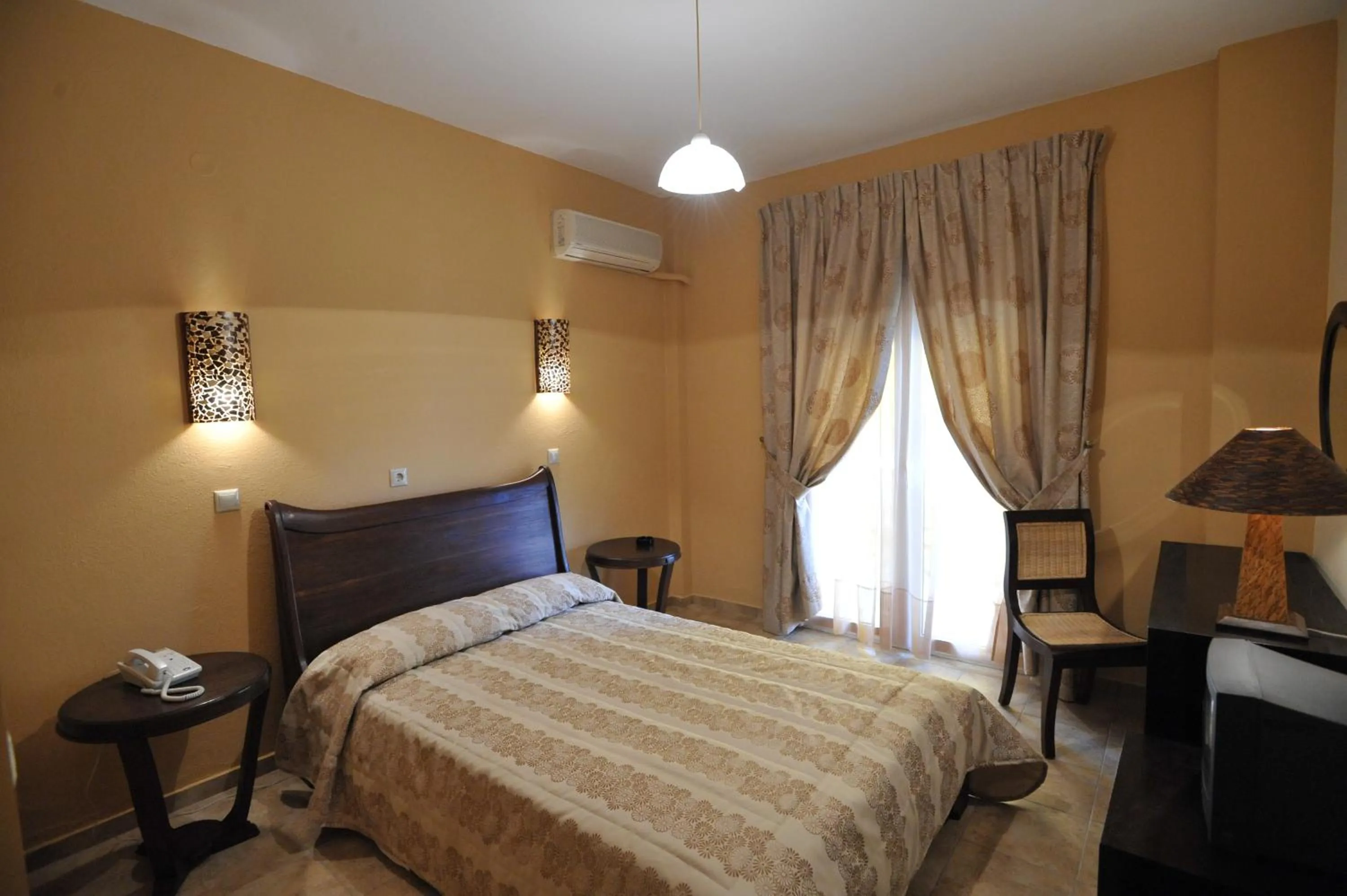 Bed in Hotel Kalloni