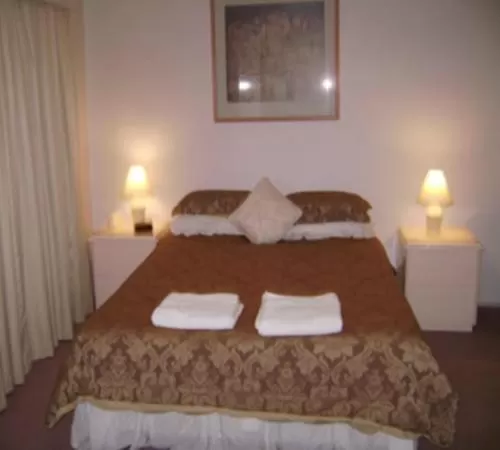 Bed in River Park Motor Inn