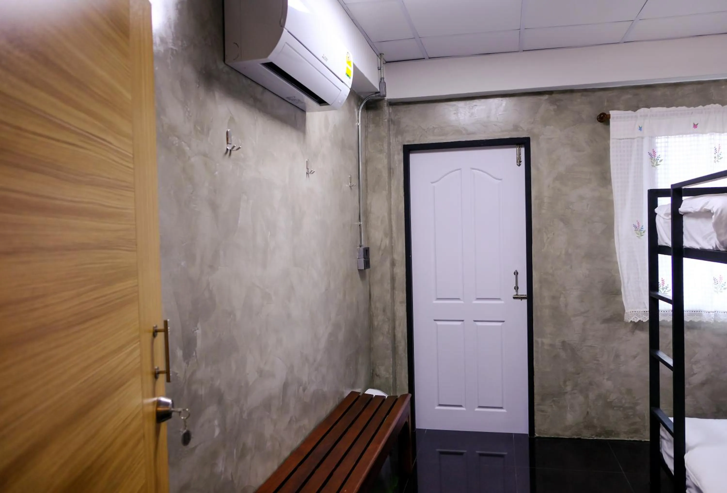 Bedroom in Baan Lung Poshtel