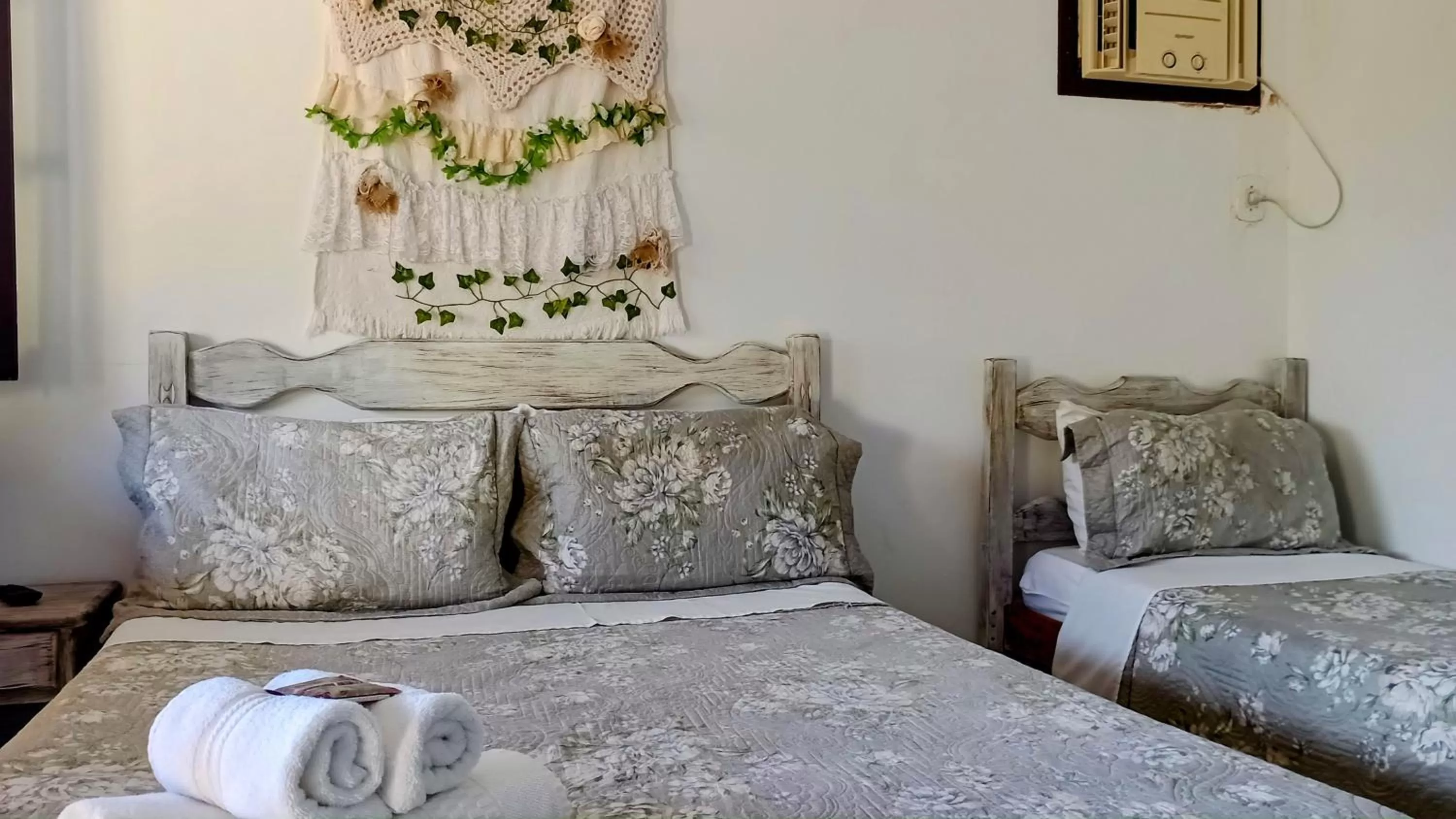 Bed in Hibiscos Pousada