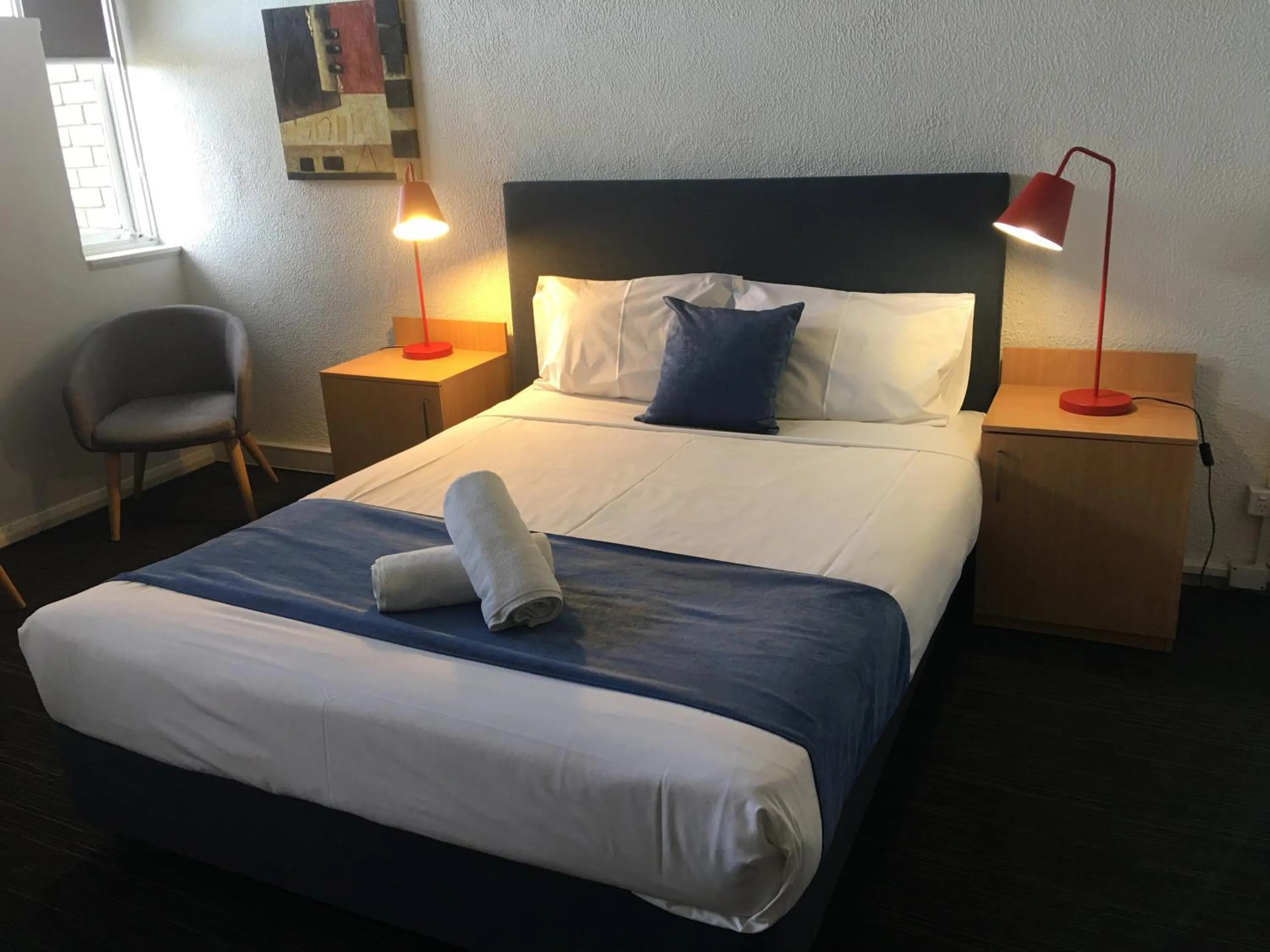 Bed in Parkdale Motor Inn