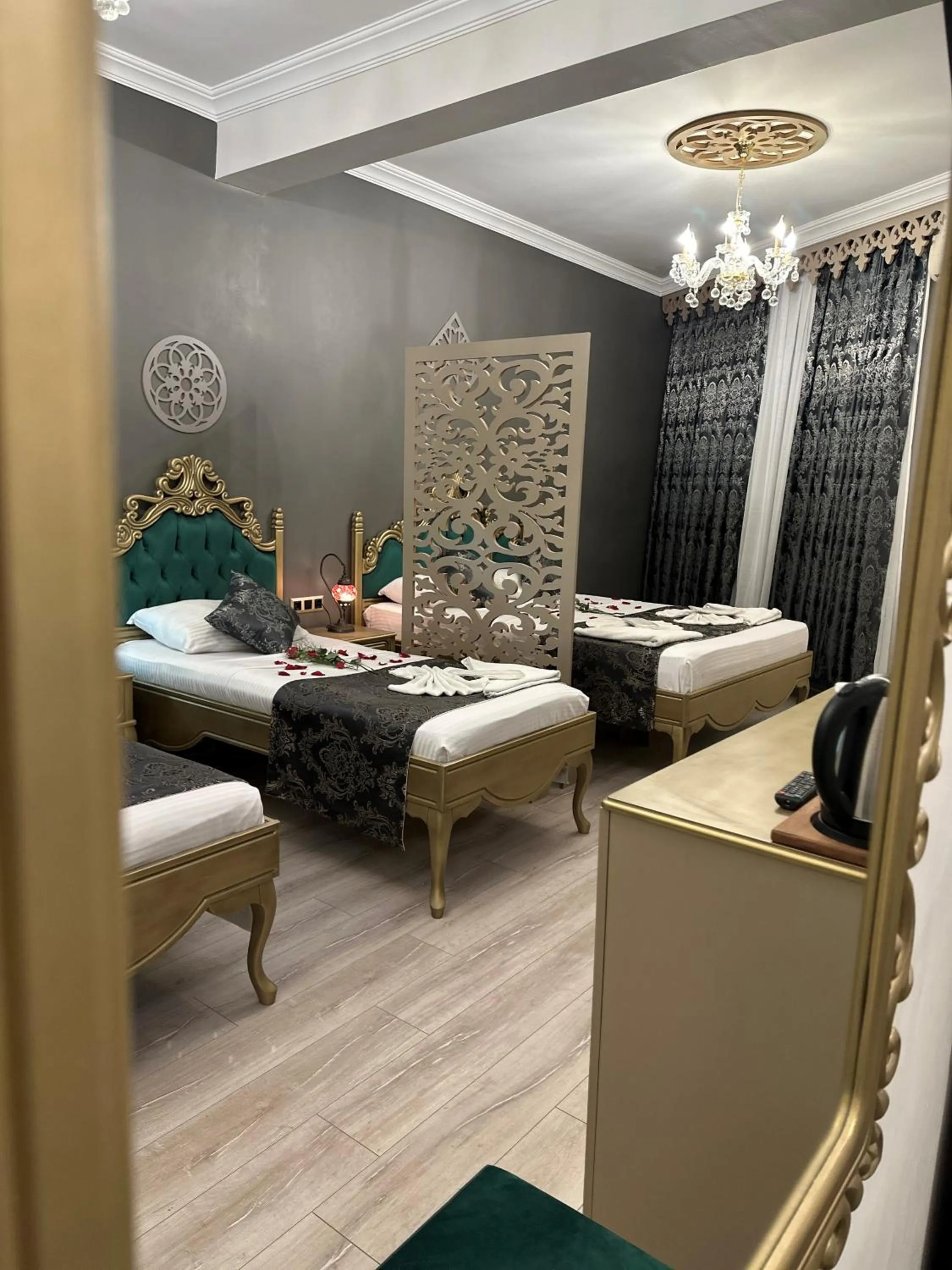 Bed in Ethnica Suites