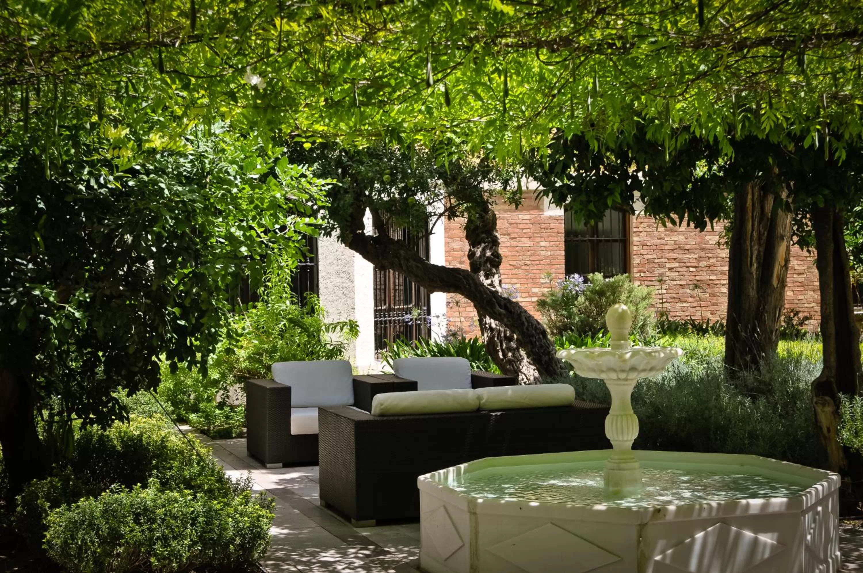 Garden in Hospes Palacio de los Patos, a Member of Design Hotels