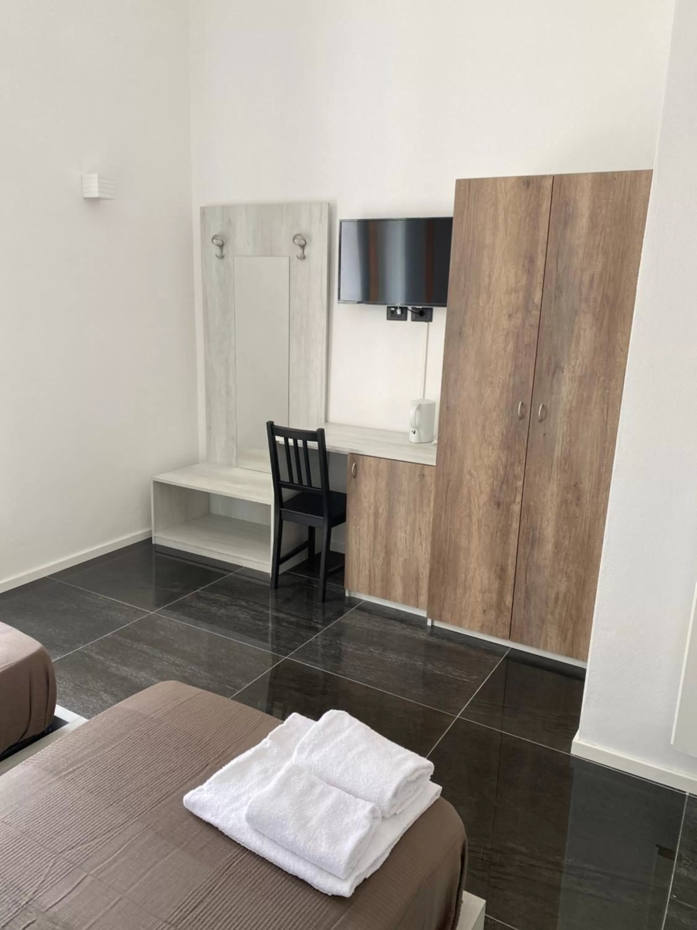 TV/Entertainment Center in Hall inn B&B in Chiostro