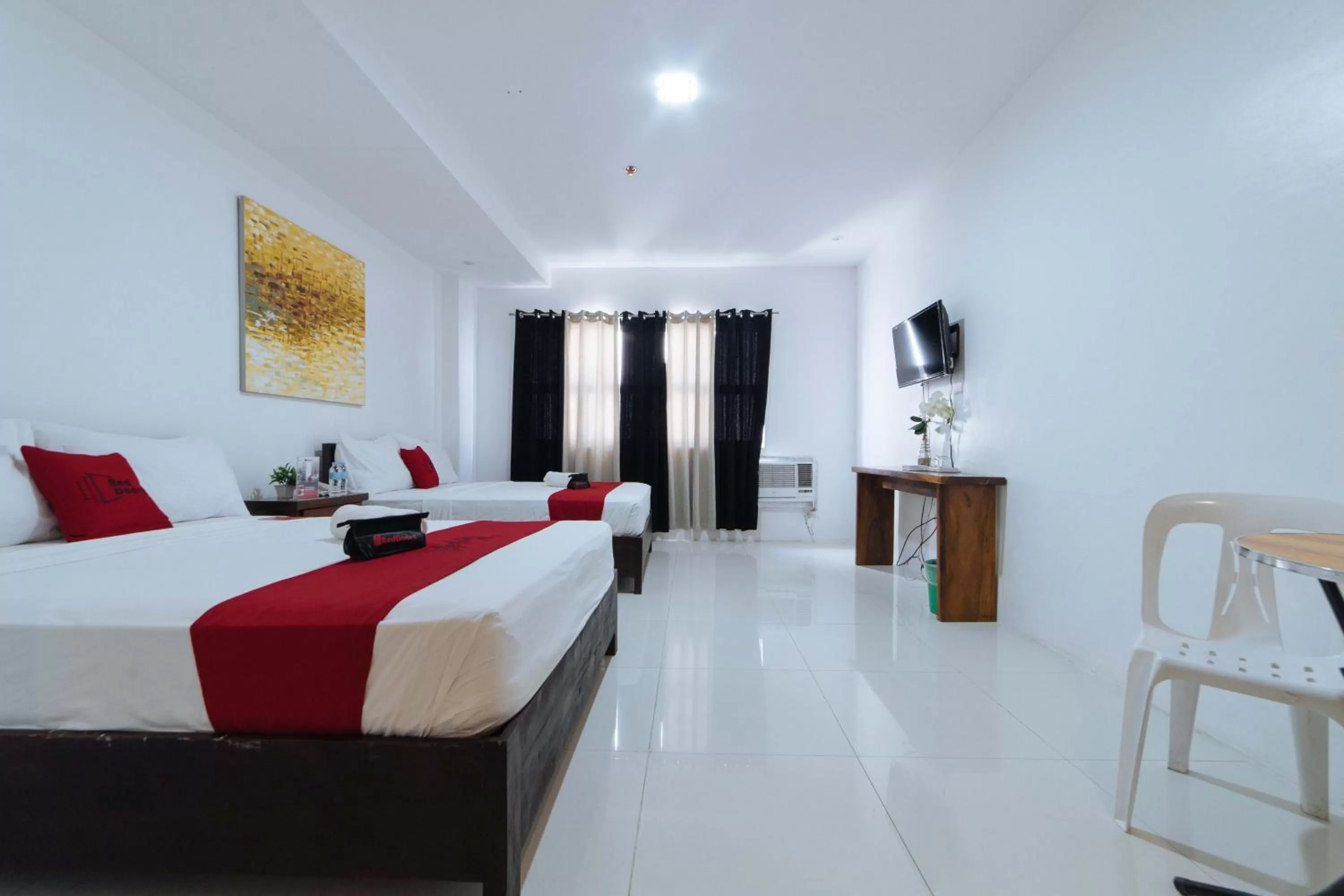 Photo of the whole room, Bed in RedDoorz Plus @ San Roque Roxas City