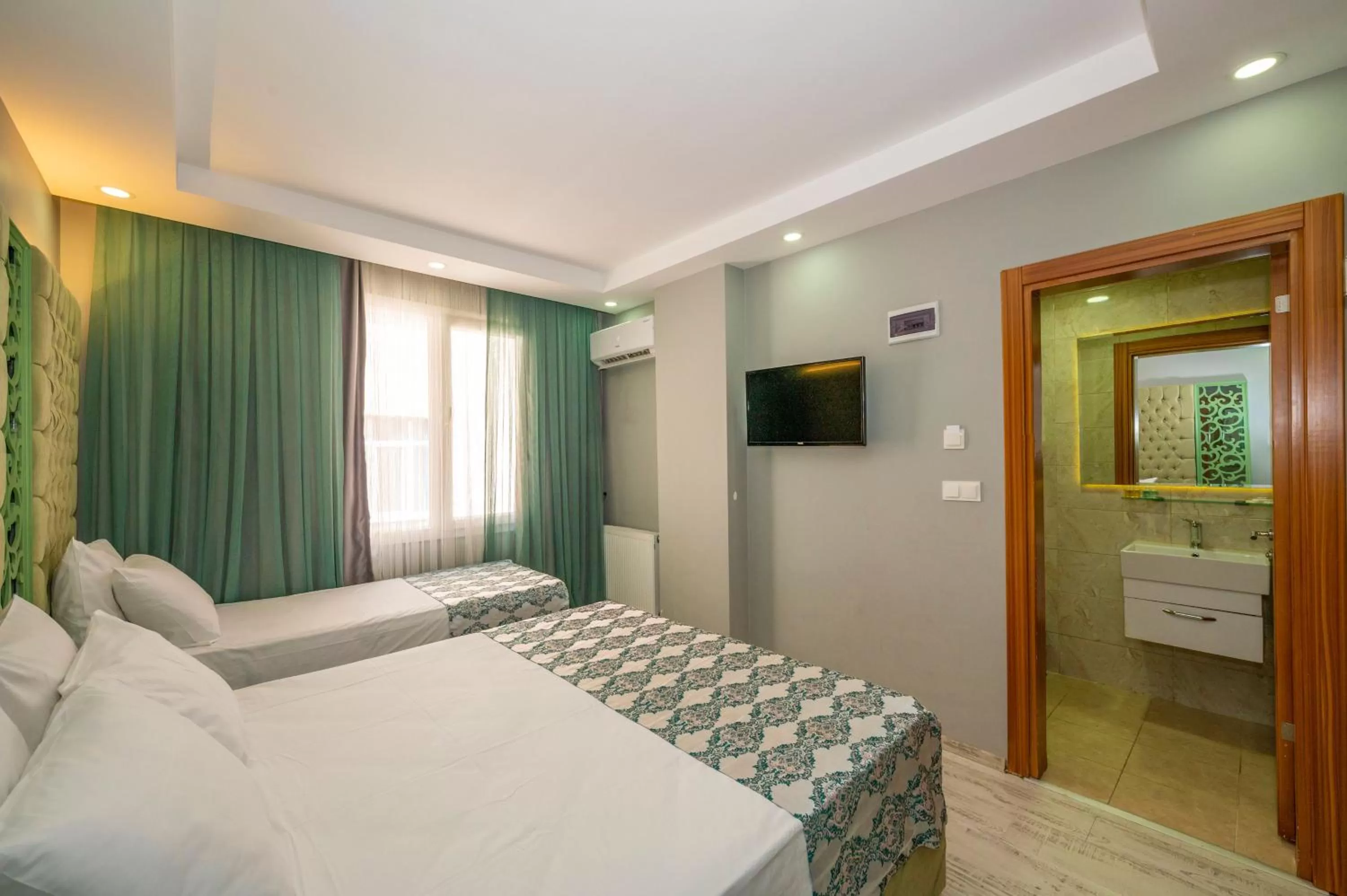 Photo of the whole room, Bed in Green Garden Hotel