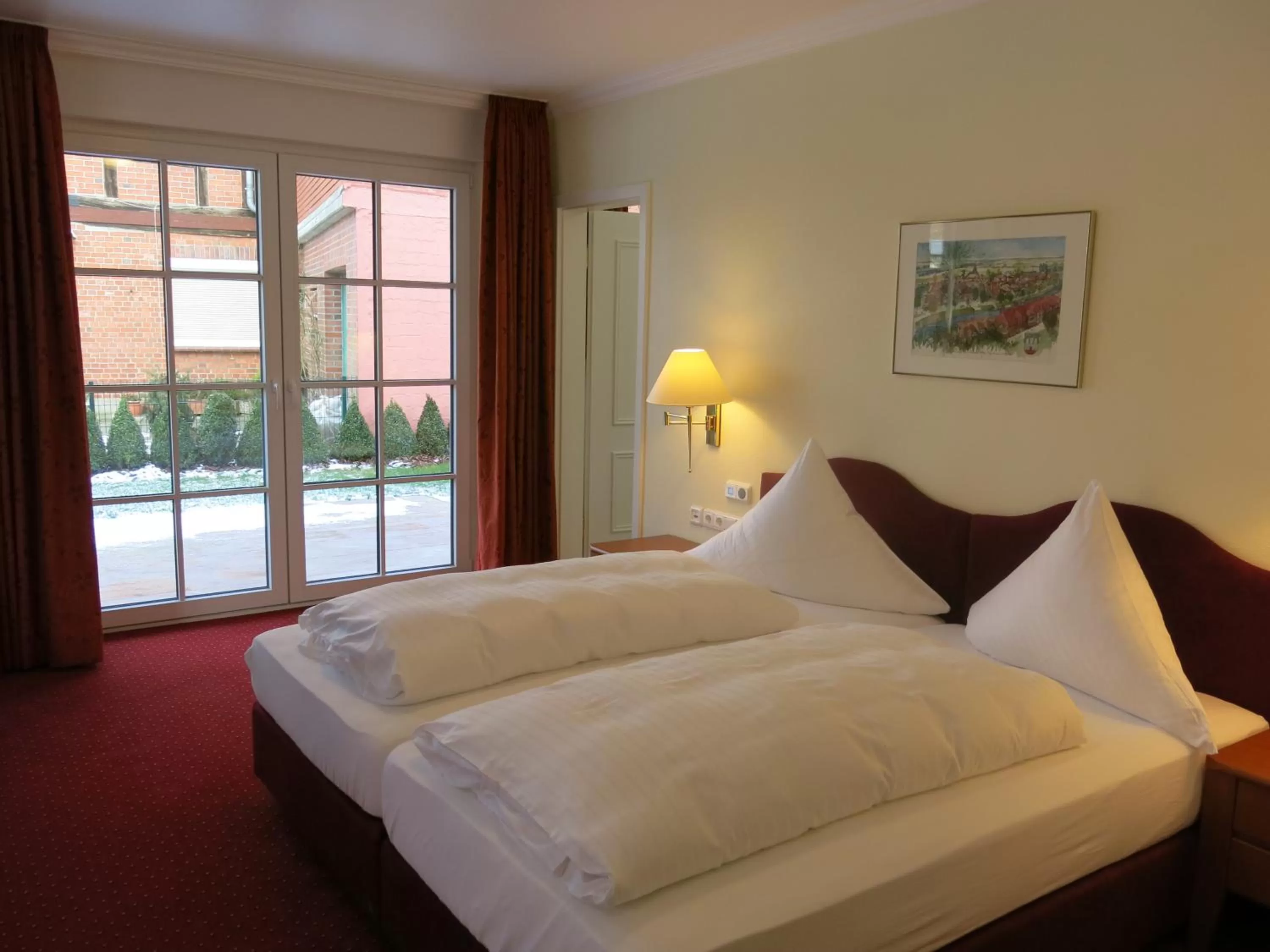 Photo of the whole room, Bed in Hotel Hafen Hitzacker - Elbe