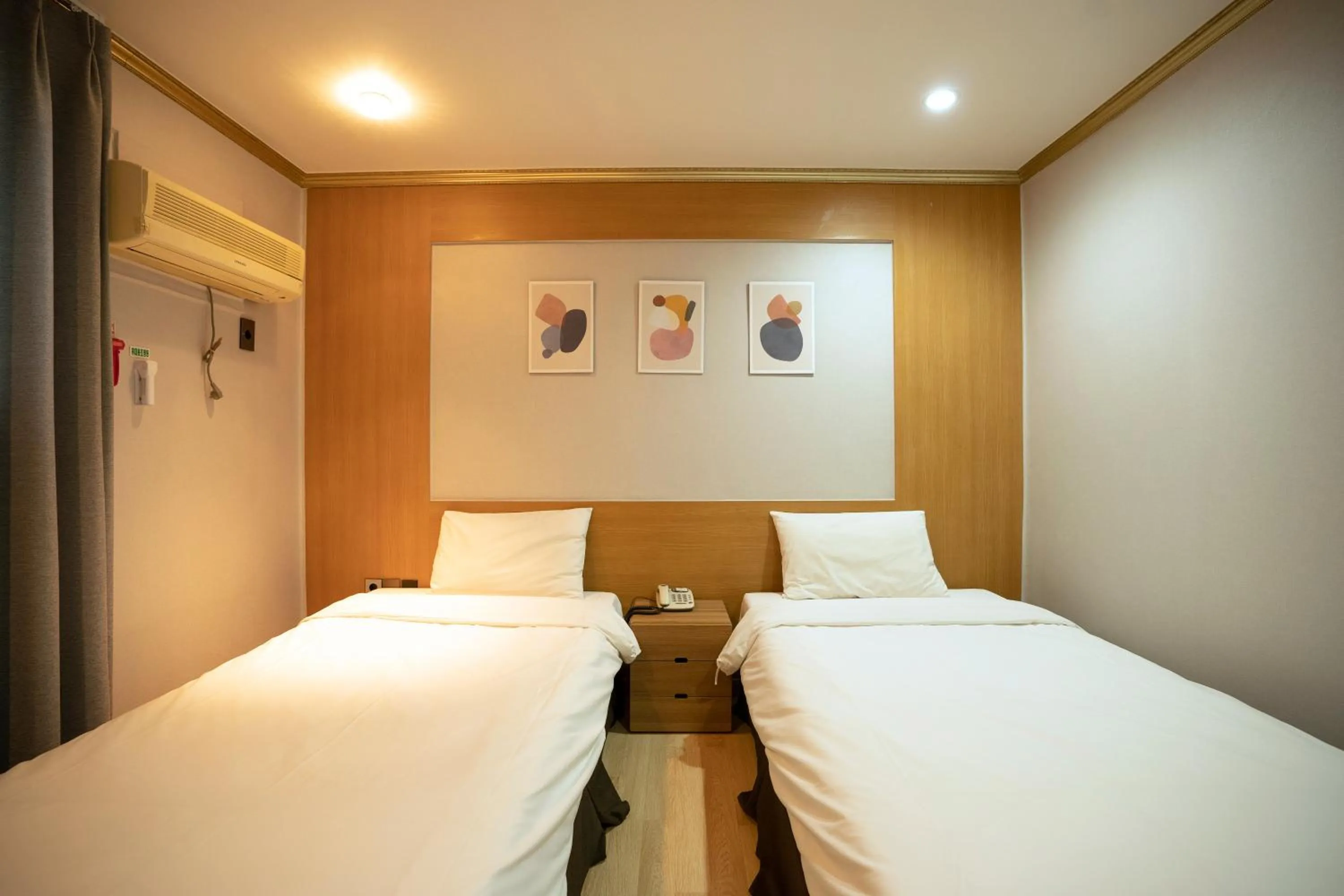 Bed in Jeju Stay Hotel
