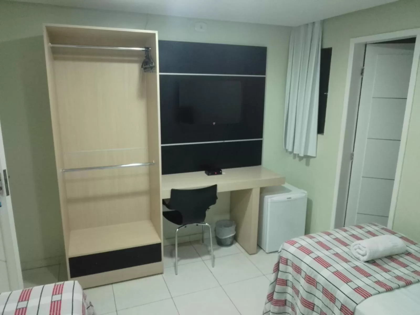 Photo of the whole room, Bed in LW Hotel