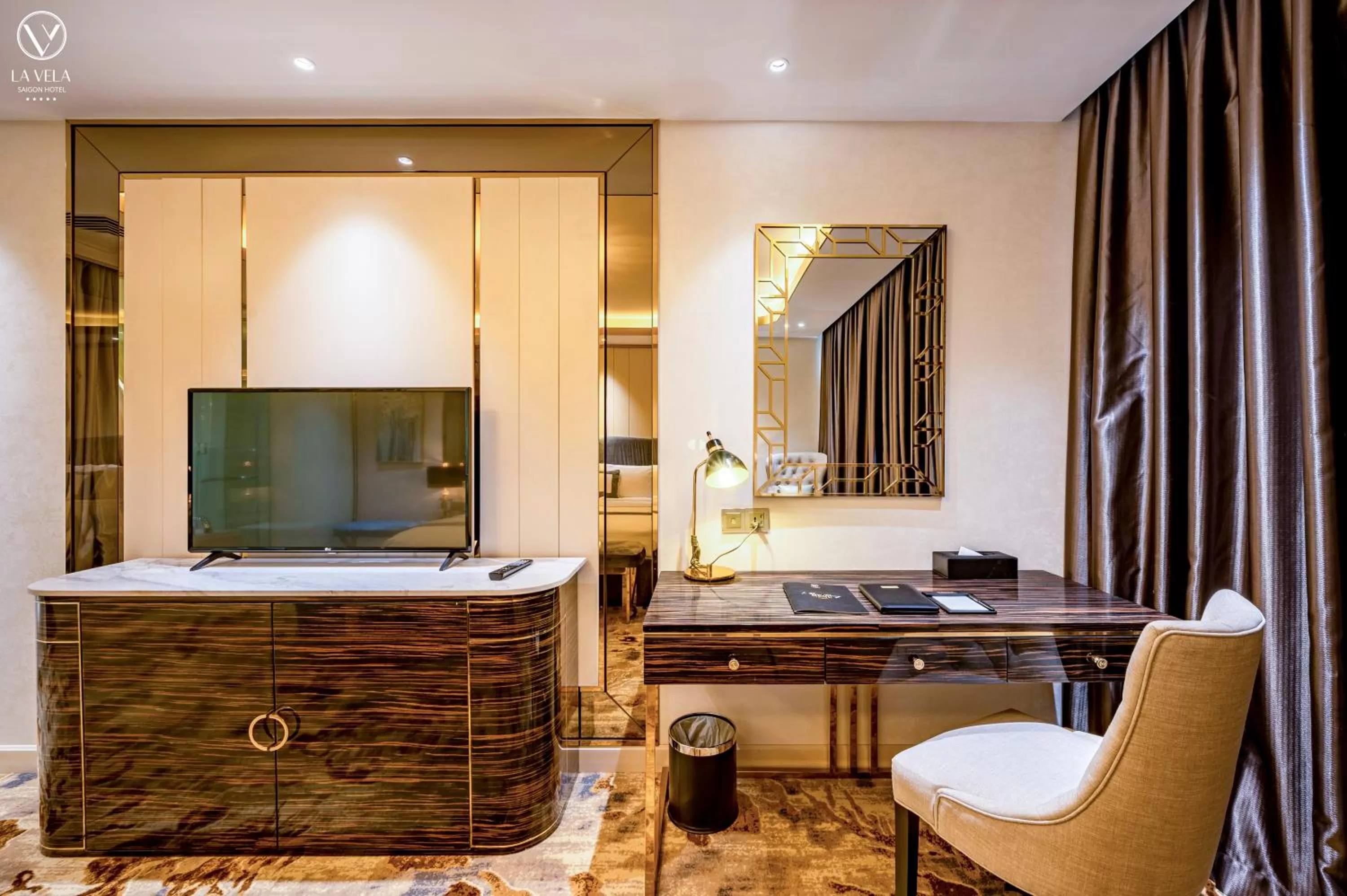Bedroom in La Vela Saigon Hotel