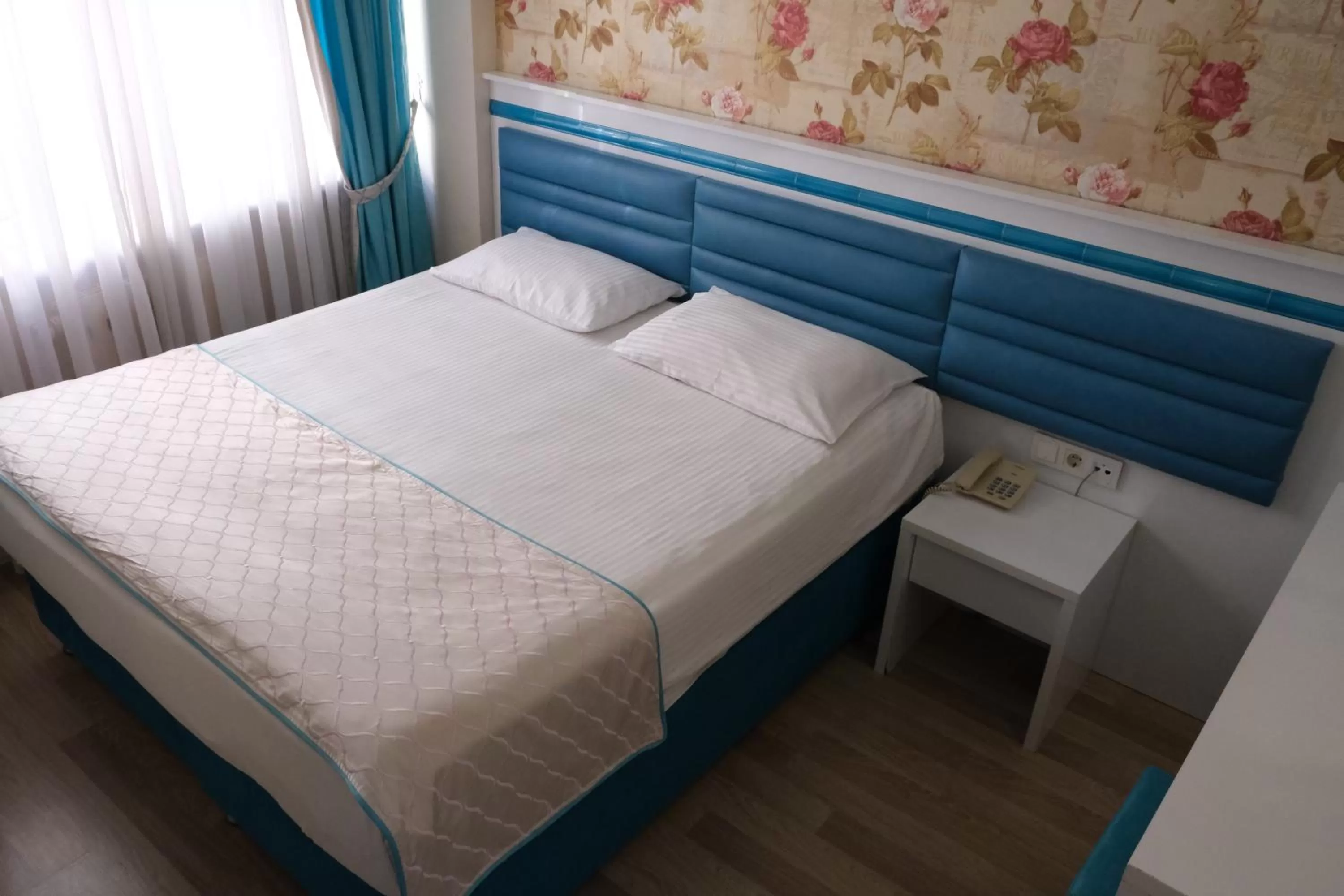 Bed in Star Holiday Hotel