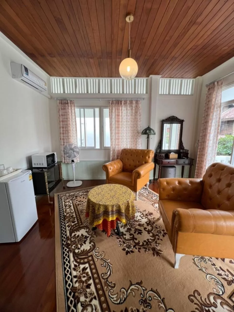 Living room in RoomQuest Rim Praya Dinsor Road