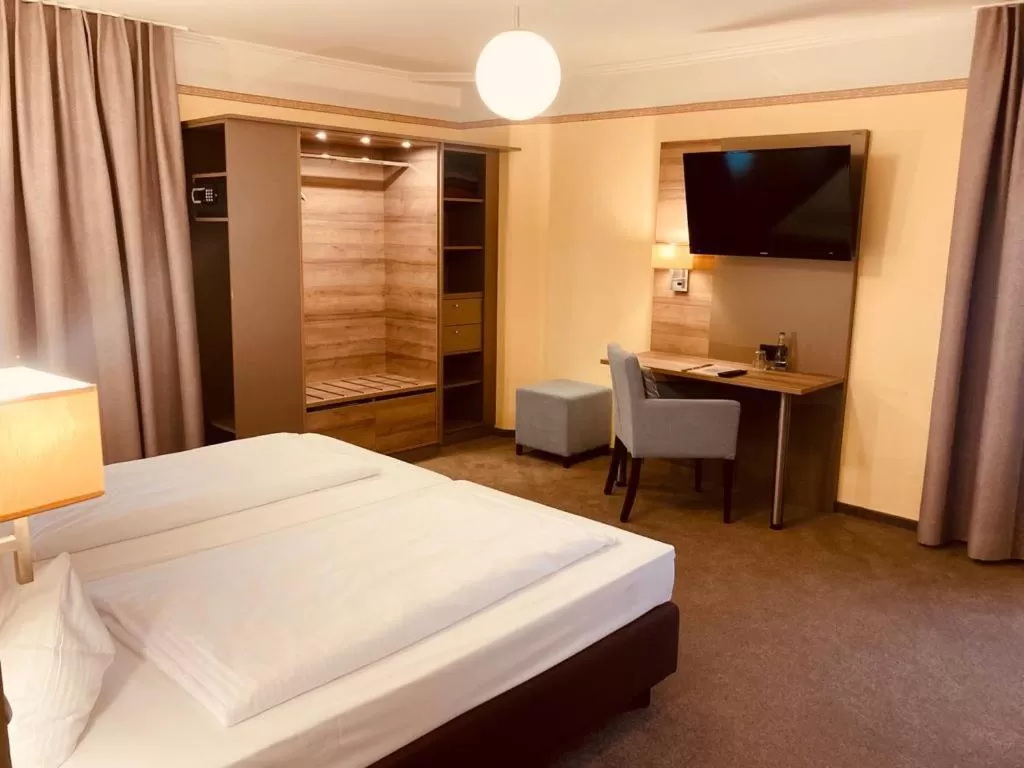 Bed in Hotel Rosenheimer Hof