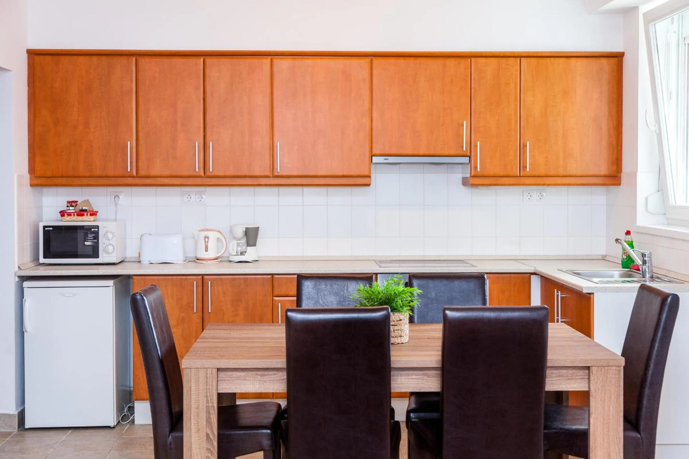 Kitchen or kitchenette in Nova Apartments