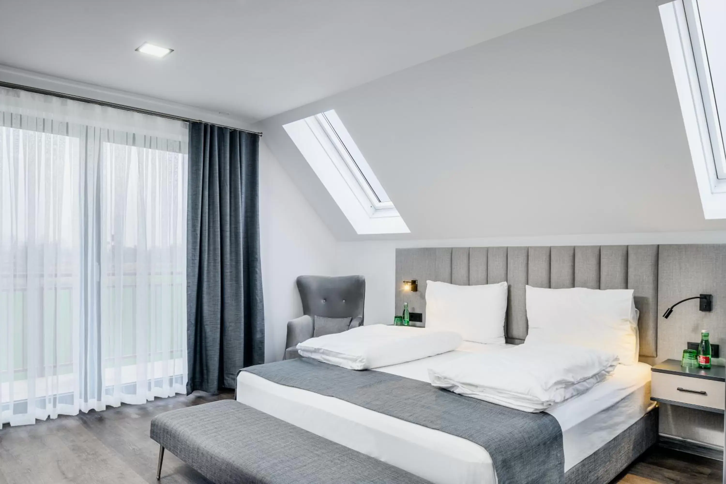 Junior Suite with Balcony - single occupancy in PARKHOTEL BRAUNAU - 24 Stunden Self Check-IN Junior Suite with Balcony - single occupancy in PARKHOTEL BRAUNAU - 24 Stunden Self Check-IN
