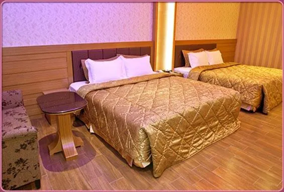 Decorative detail, Bed in Wei Feng Hotel - Kaohsiung