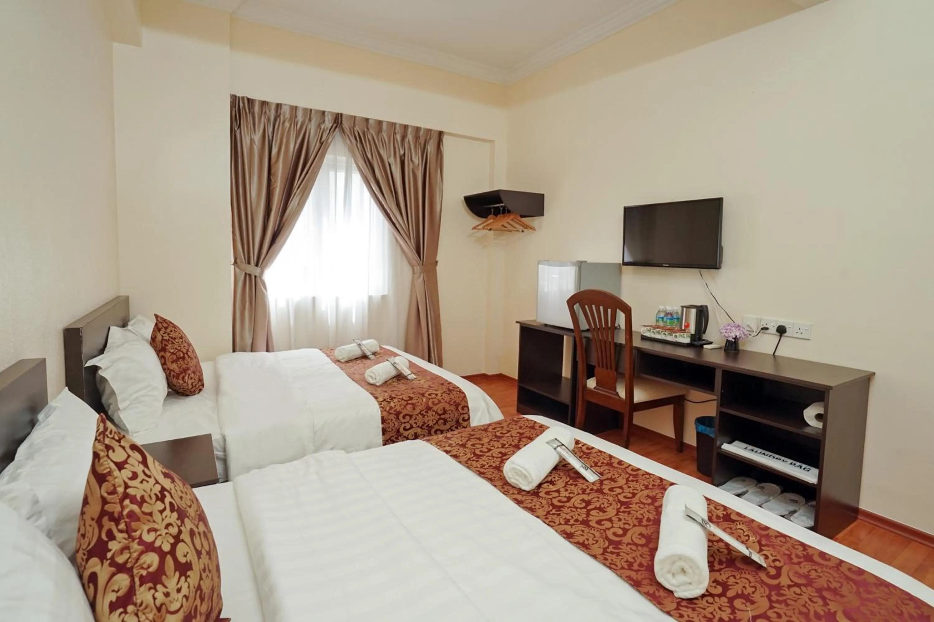 Photo of the whole room, Bed in RJ Hotel Kulai