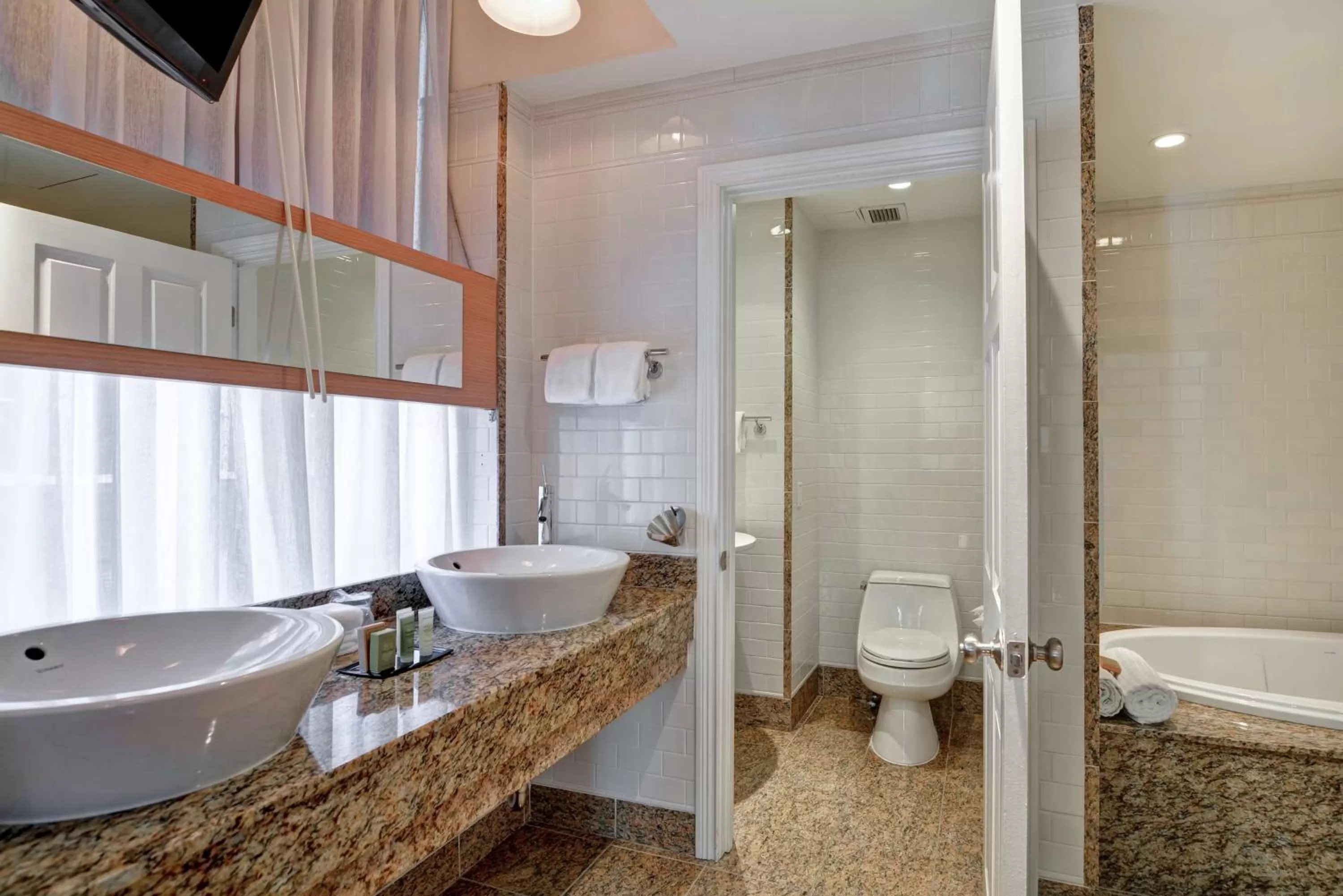 Bathroom in The Cincinnatian Curio Collection by Hilton