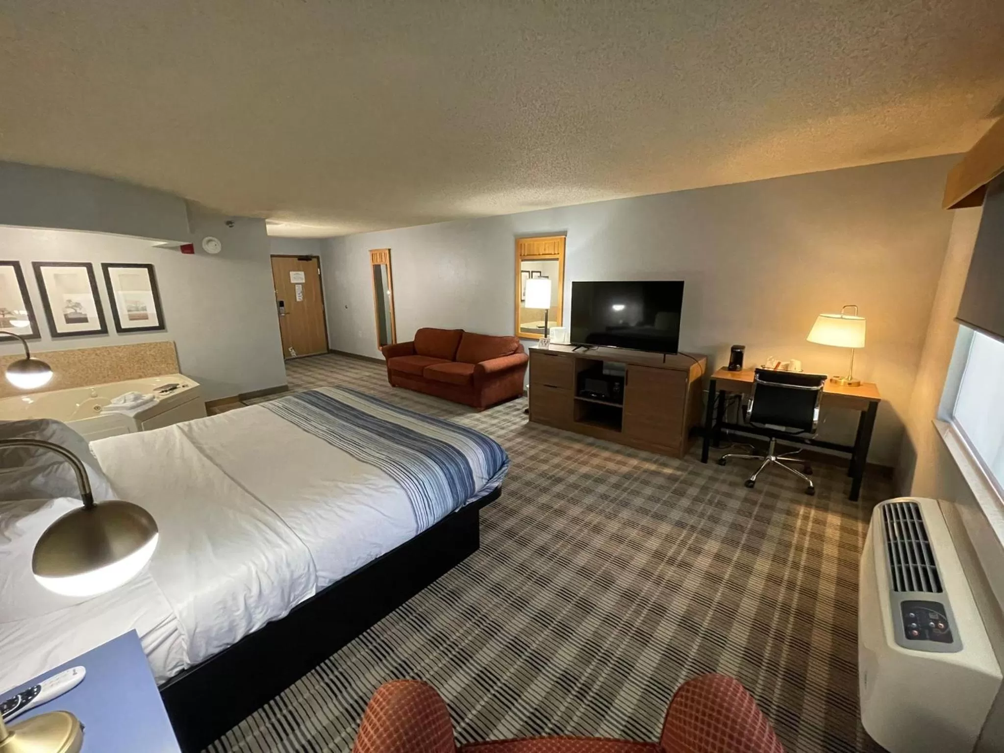 Photo of the whole room, Bed in AmericInn by Wyndham Sayre