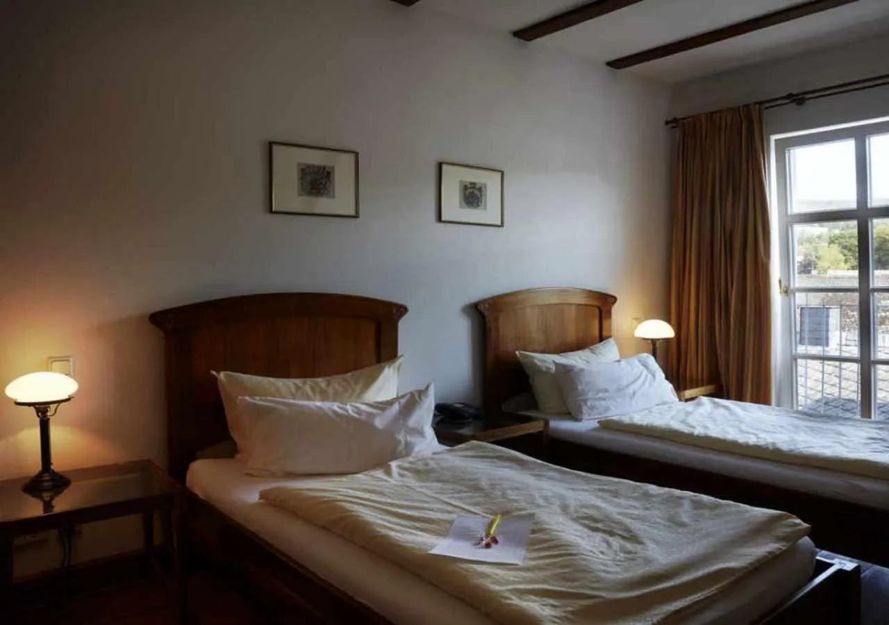 Bedroom, Bed in Hotel Snorrenburg GmbH