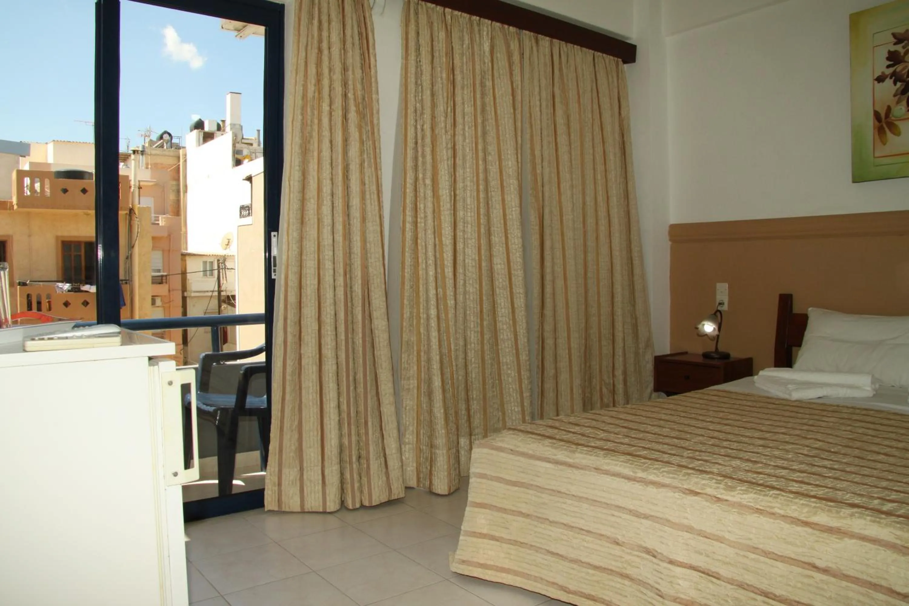 Bedroom, Bed in Danaos Hotel