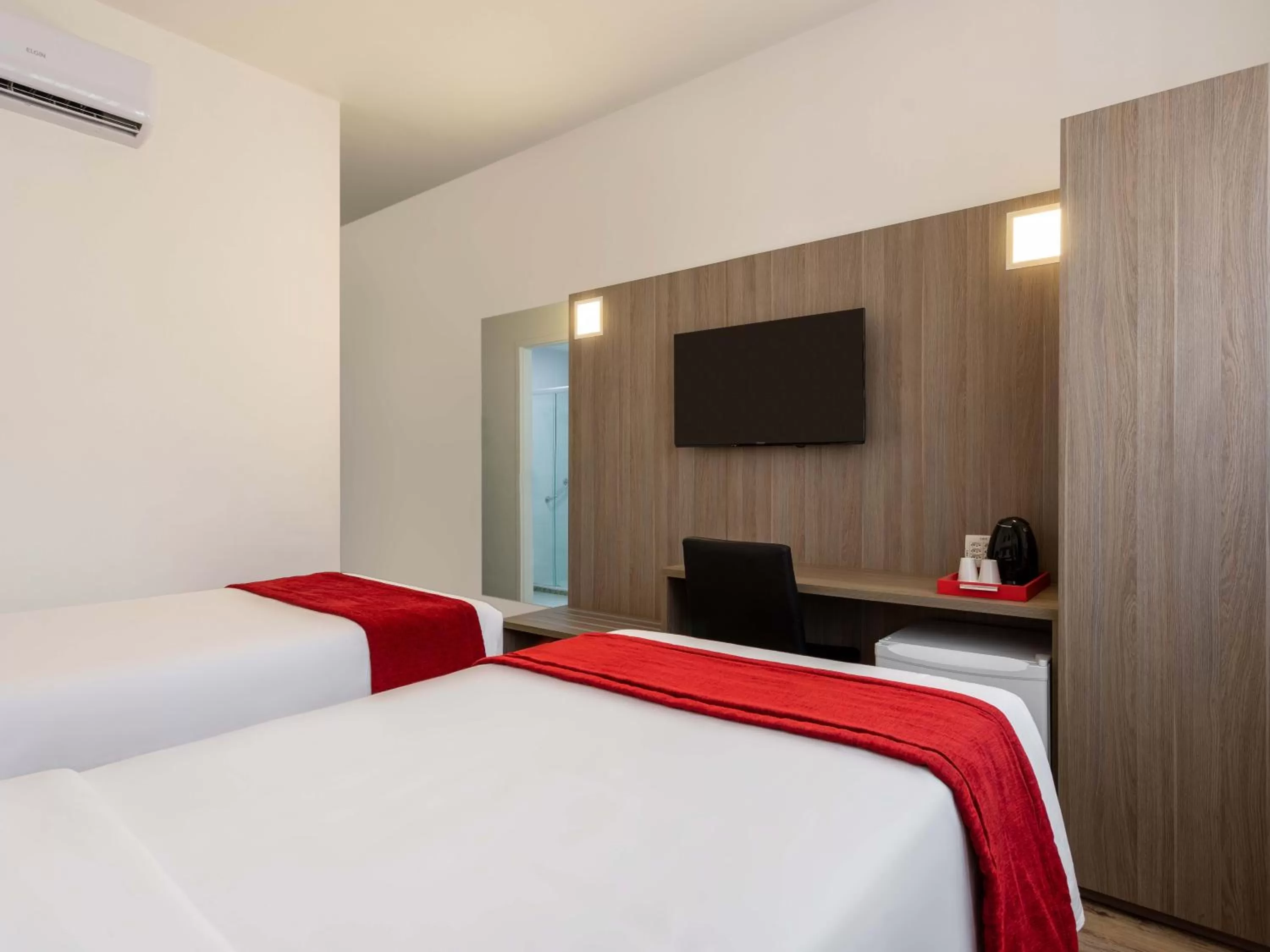 Bed in Ramada Encore by Wyndham São Paulo Osasco